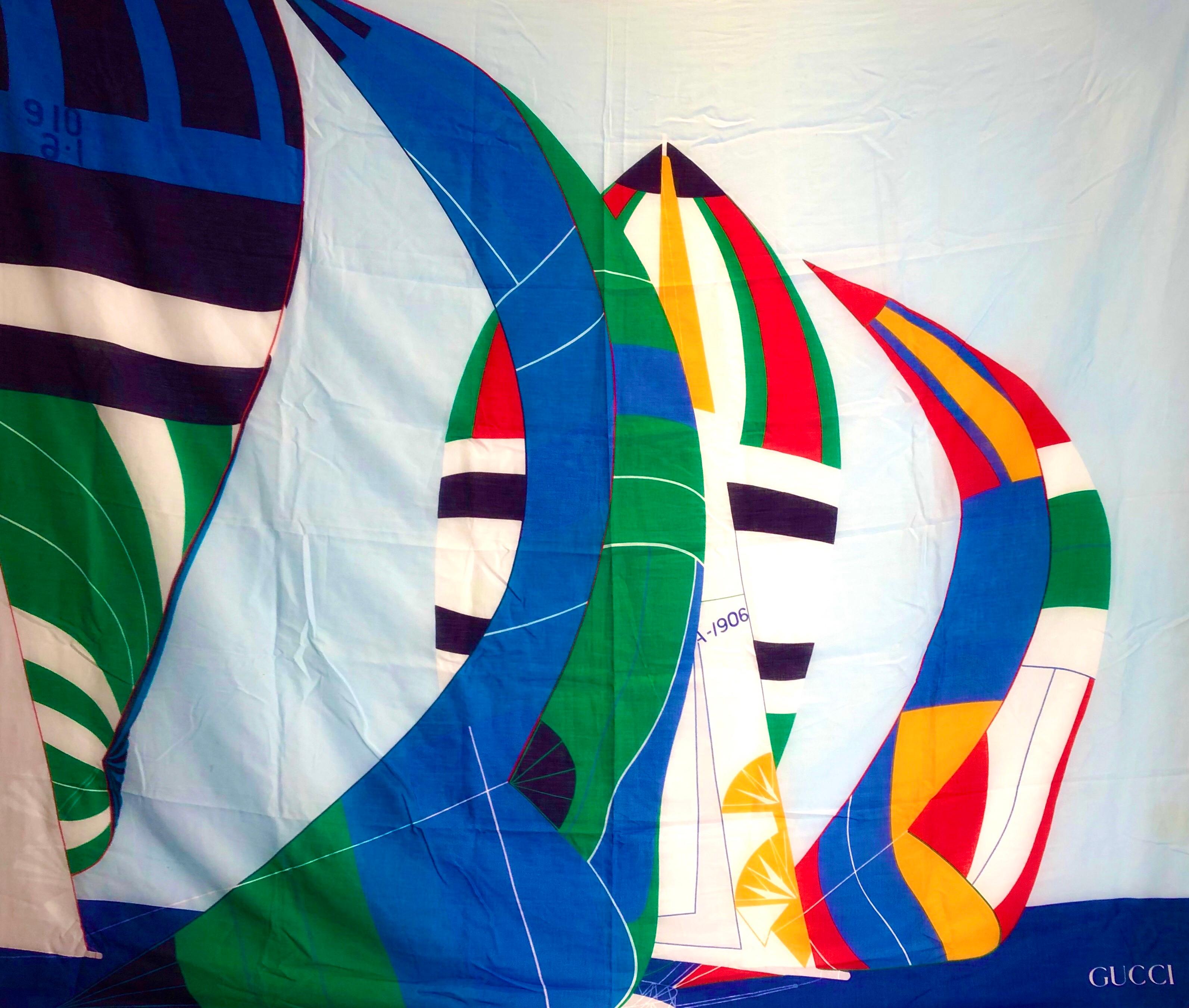 This is an extremely rare Gucci cotton scarf pareo beach cover shawl featuring abstract sailing boats print, hand rolled and sewn edges, Made in Italy 

Condition: excellent, 1980s 

Measurements: Large, 61” x 52”, 155x132cm