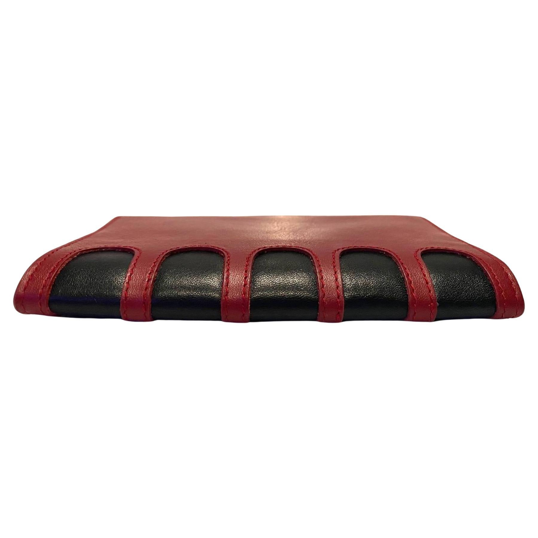 Manolo Blahnik Passport Cover, Winter 18 Limited Edition, burgundy and black two-tone leather, logo embossed inside

Condition: 2010s, pre-owned, new with original box and dust bag 

Dimensions: 	14.2x9.8cm / 5.5x3.8in