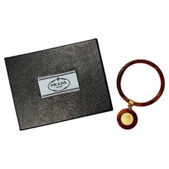 1990s Prada Gold Resin Plated Medallion Bangle Bracelet