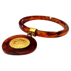 1990s Prada Gold Resin Plated Medallion Bangle Bracelet