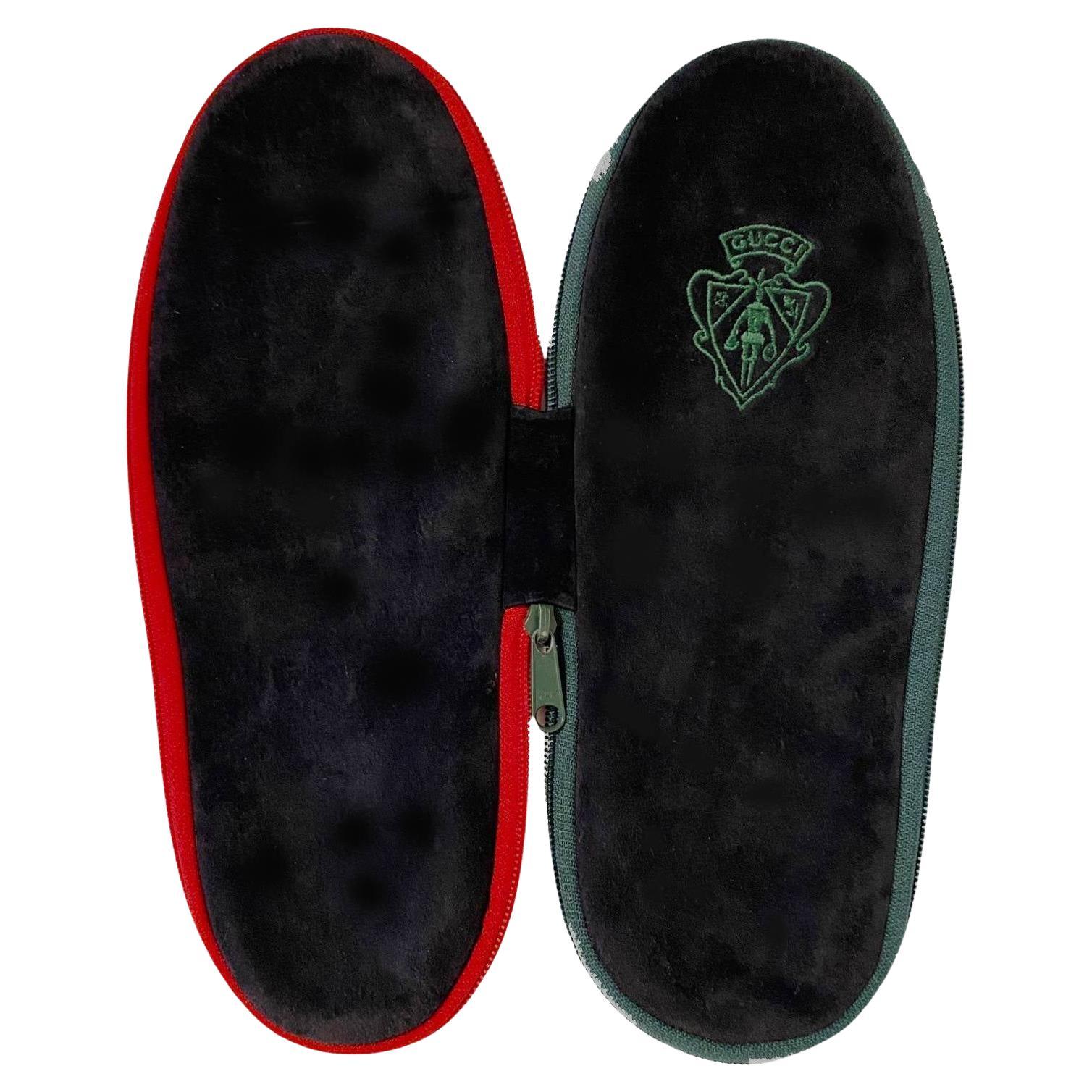 1980s Gucci Black Suede Slippers Travel zipped case,  This travel case serves as a fashionable way to protect your essentials while on the go. The timeless style of Gucci's classic black suede is sure to be admired.

Condition: 1980s, vintage, very