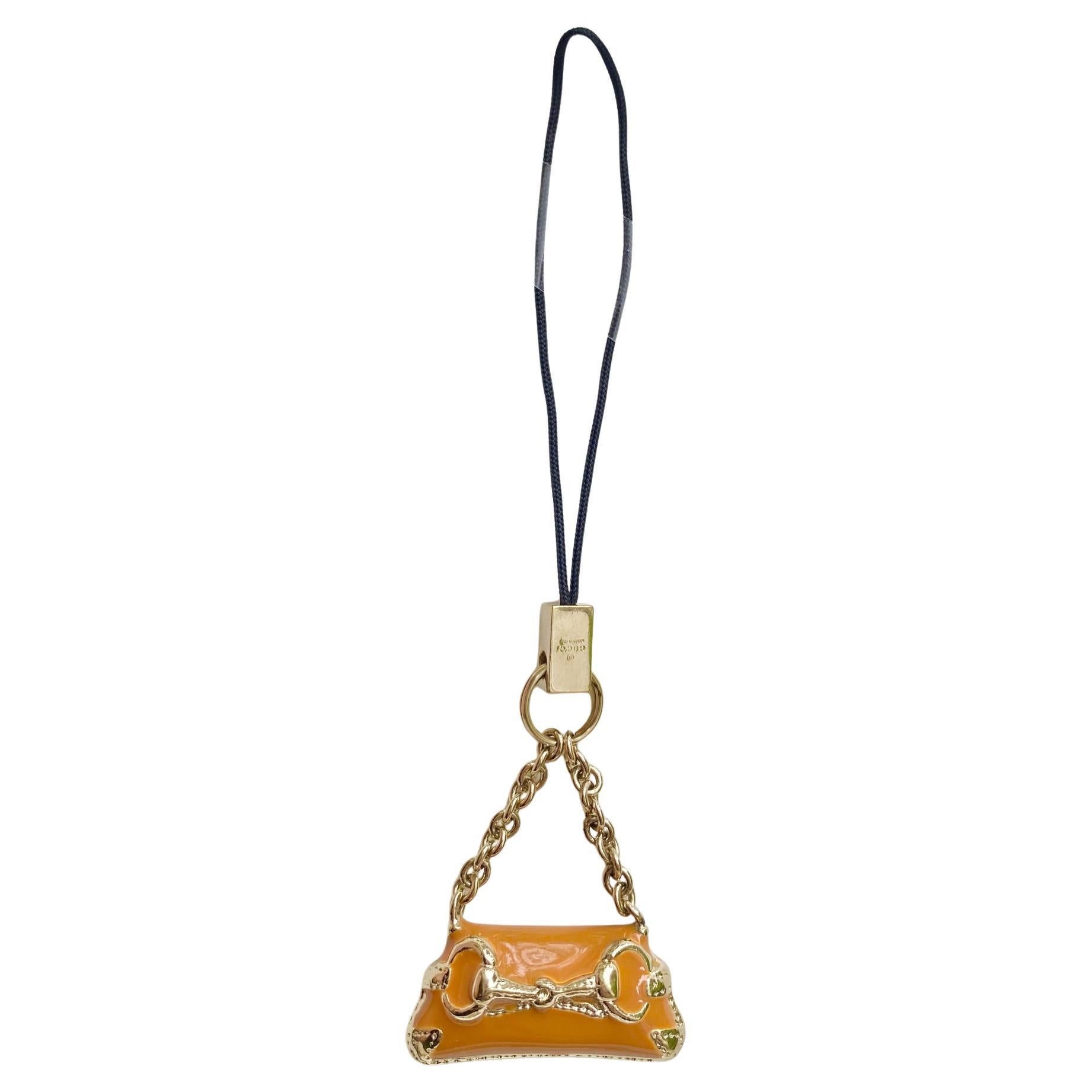2000s Vintage Gucci Orange Metal Lacquered Horsebit Miniature Bag Charm Keyring