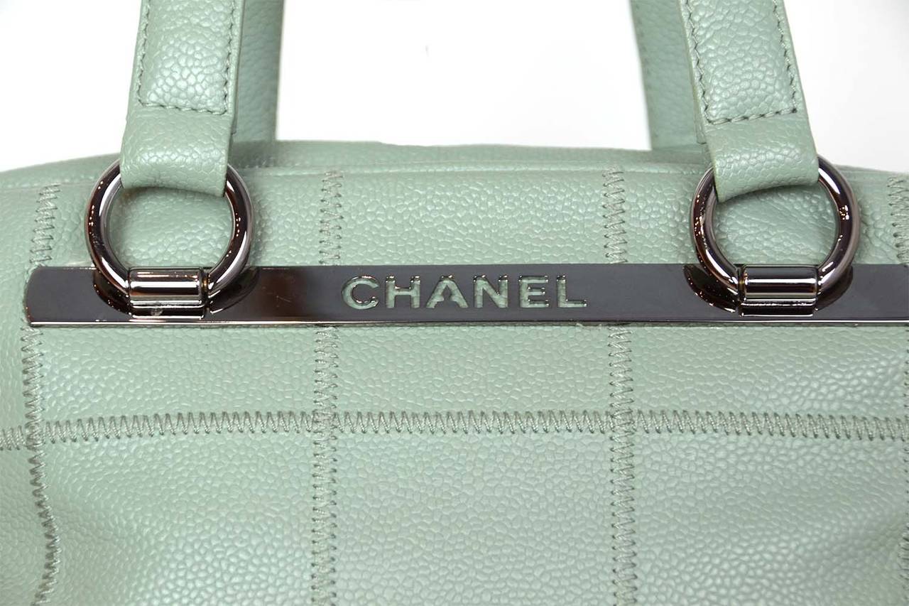 CHANEL Square Stitch Sea foam Caviar Leather Shoulder Bag

    Made in: Italy
    Year of Production: 2005
    Color: Sea Foam
    Hardware: Silver tone
    Materials: Caviar leather
    Lining: Logo Textile
    Closure/opening: Zipper
