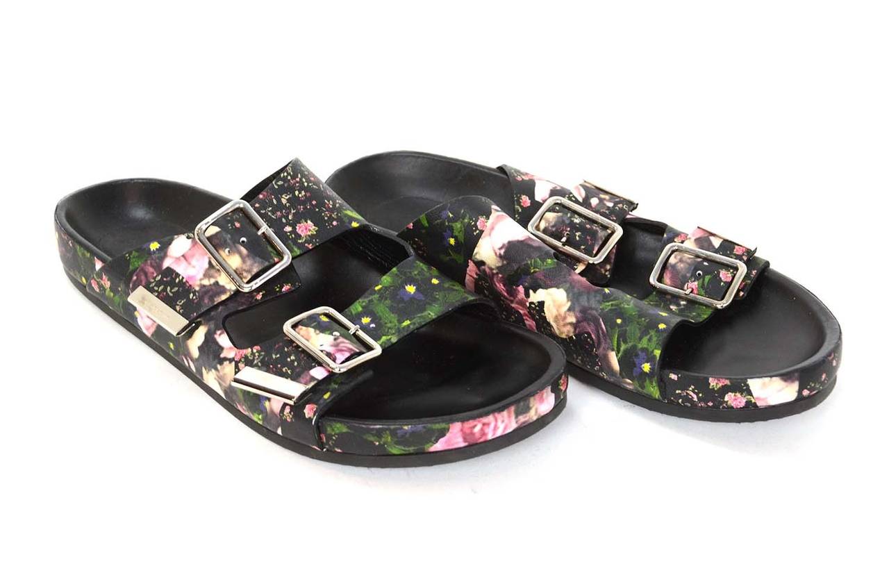 GIVENCHY Camoflague Rose Birkenstocks Sz. 9

    Made in: Italy
    Color: Black floral print
    Sole Stamp: Givenchy Paris
    Closure/opening: Two Buckles
    Overall Condition: Excellent pre-owned condition, very few wears 

Marked Size:
