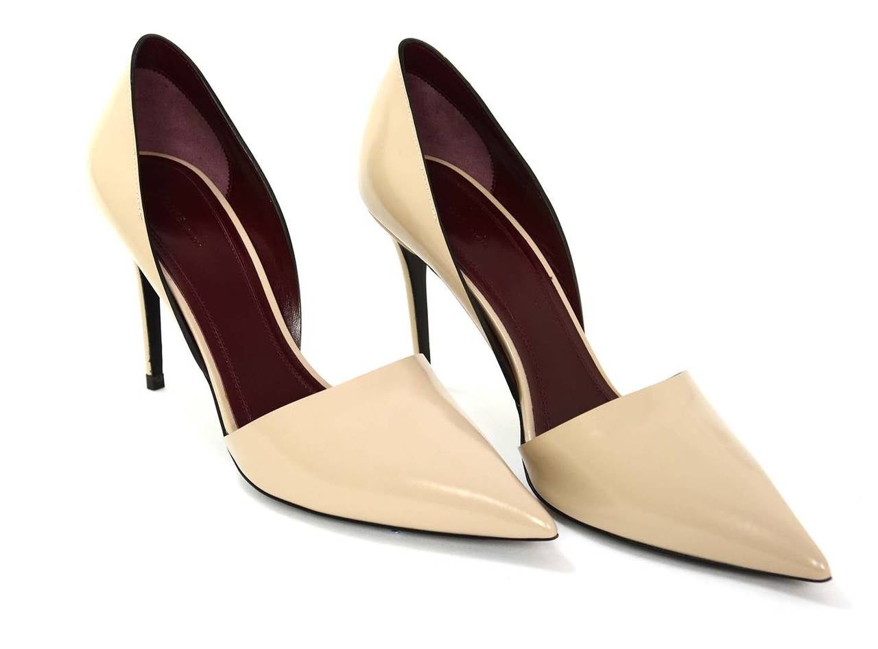 CELINE New Nude Glazed Leather Point Toe Pumps
Made in: Italy
Color: Nude
Composition: Leather/glazed leather exterior
Sole Stamp: CELINE Paris
Overall Condition: Excellent condition, never worn
Marked Size: 38.5, estimated to fit a US size