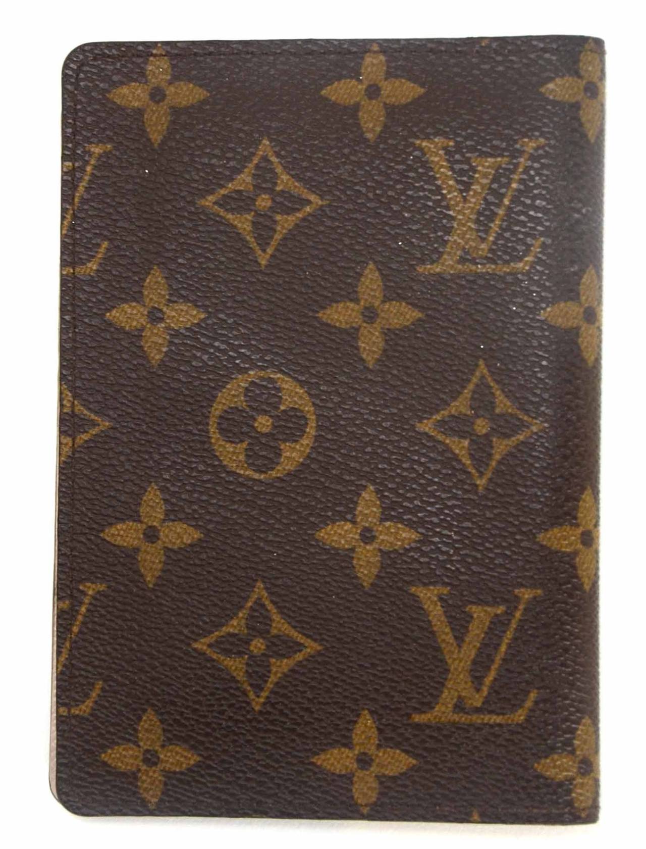 LOUIS VUITTON Monogram Limited Edition Trunks and Locks Passport Cover c.'13

    Made in: Spain
    Year of Production: 2013
    Color: Monogram
    Materials: Coated canvas
    Lining: Coated canvas
    Interior Pockets: 3 Credit card