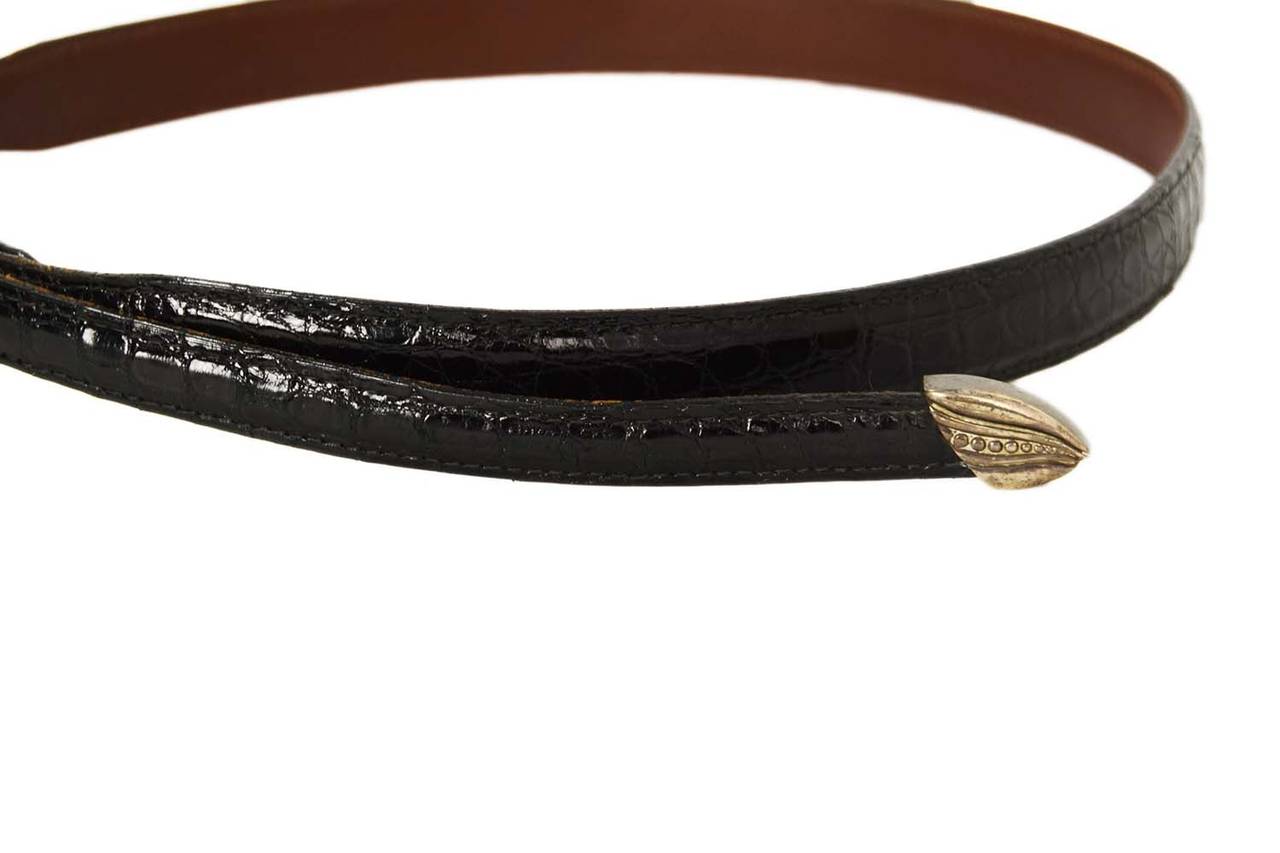 Features sterling tip at end of belt and two sterling belt loops

-Made in: U.S.A
-Year of Production: 1981
-Stamp: B. KIESELSTEIN CORD 1981 D* U.S.A. STERLING
-Stamp on Belt: BARRY KIESELSTEIN CORD NEW YORK
-Color: Black, silver
-Materials: