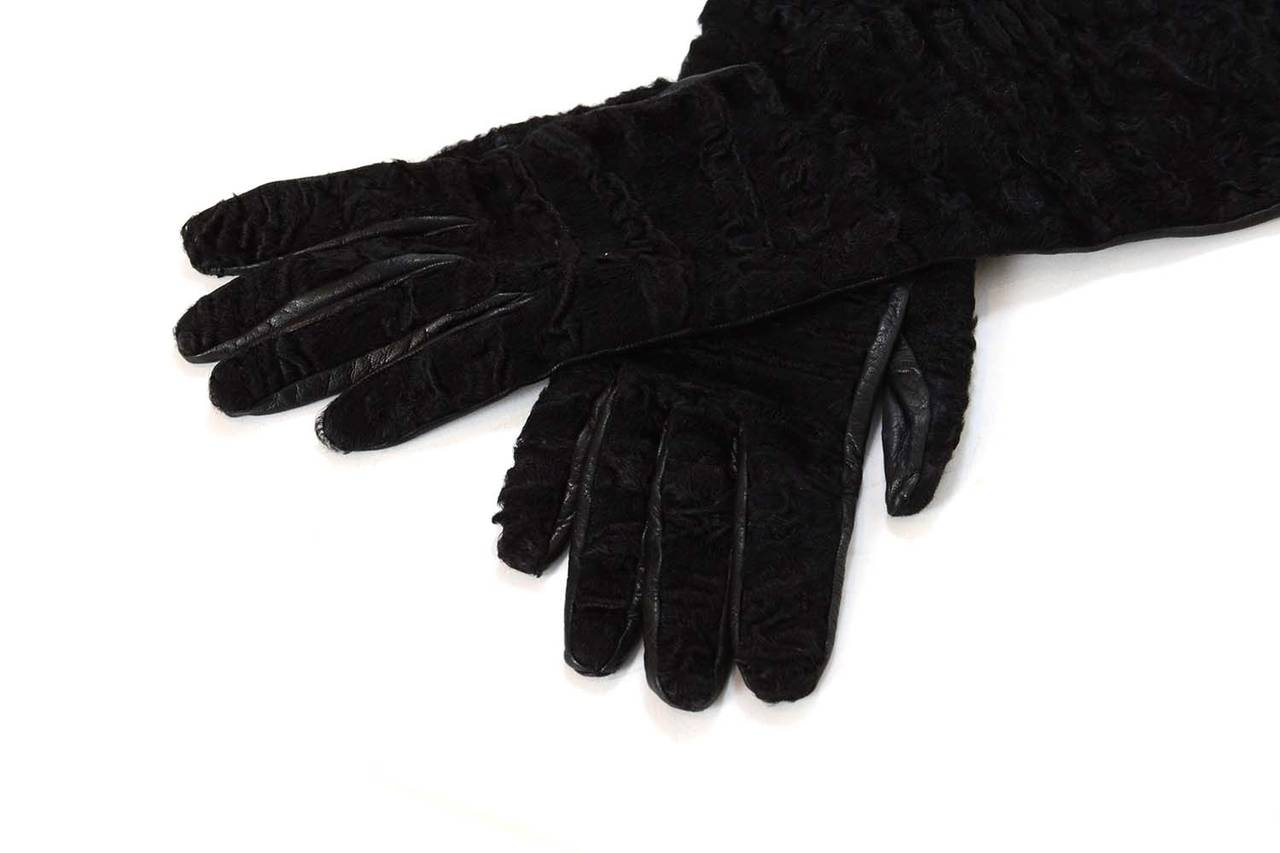 Prada Black Persian Lamb & Leather Long Gloves

Made in: Italy
Color: Black
Composition:100% dyed broad tail lamb fur & 100% lambskin
Tags: PRADA
Lining: 100% silk
Closure/opening: Snap to middle which allows owner to get in out of glove more