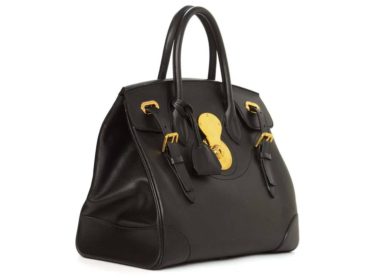 Color: Black
    Hardware: Goldtone
    Materials: Leather
    Lining: Leather
    Closure/opening: Clasp lock, two straps and buckles
    Exterior Pockets: N/A
    Interior Pockets: One zippered, one snap
    Retail Price: $3500
   