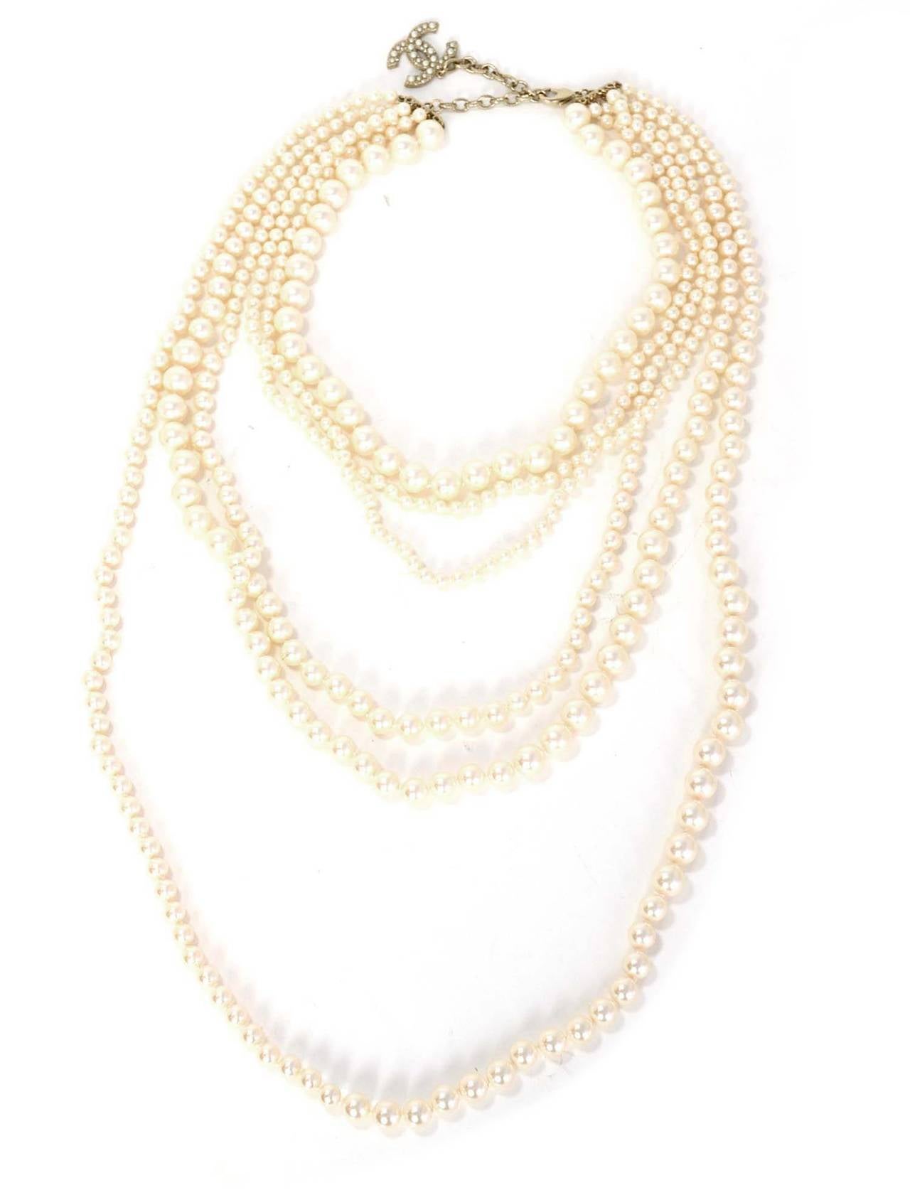 CHANEL 6 Strand Faux Pearl Infinity Necklace NIB RT $3,675

    Made in: France
    Year of Production: 2014
    Stamp: CHANEL A14 C Made in France
    Closure: Lobster claps
    Color: Pearl
    Materials: Faux Pearl
    Overall Condition: