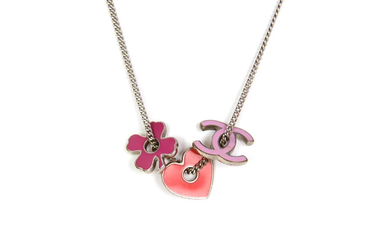 Chanel 2004 Pink/Red Enamel and Silvertone Clover Heart and CC Charm Necklace In Excellent Condition In New York, NY