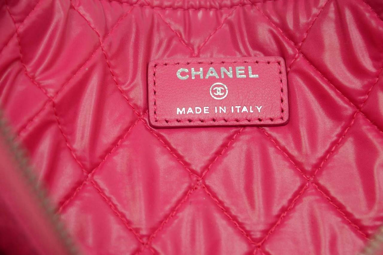 CHANEL 2015 Hot Pink Perforated Lambskin O Case Clutch Bag at 1stDibs