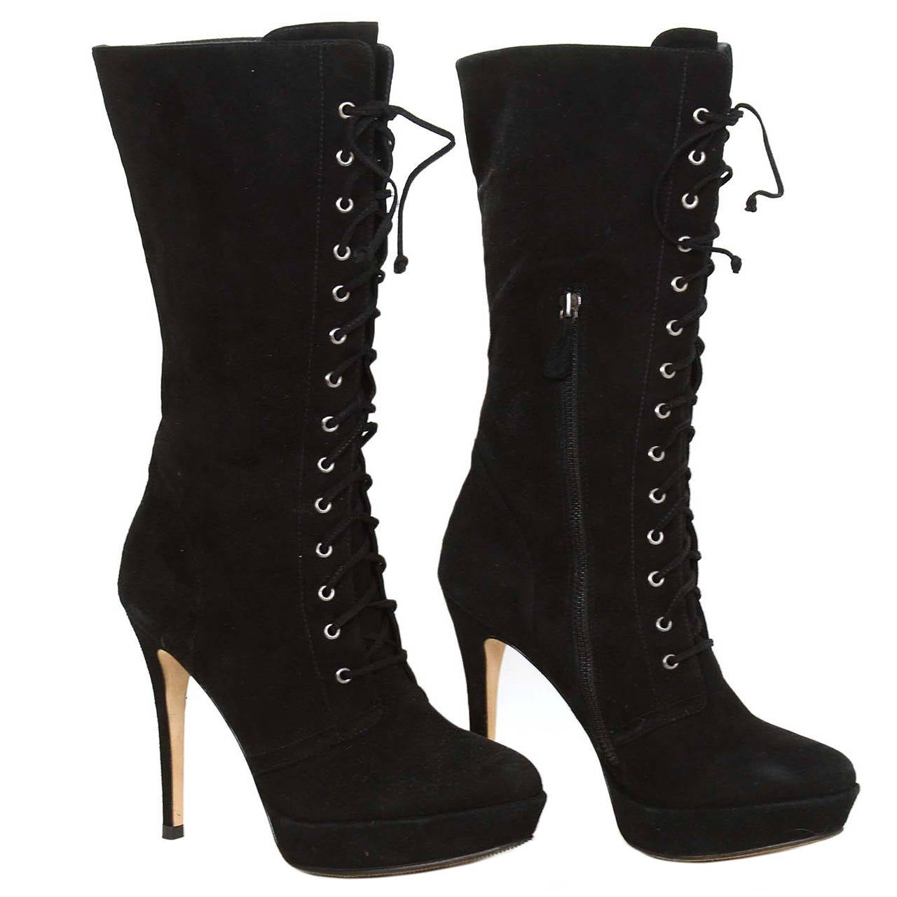 Alexandre Birman Black Suede Lace Up Boots

Made in: Brazil
Color: Black
Materials: Suede
Sole Stamp: Alexandre Birman Leather Sole
Closure/opening: Side zipper
Overall Condition: Very good pre-owned condition, some scuffs to the suede and the boots