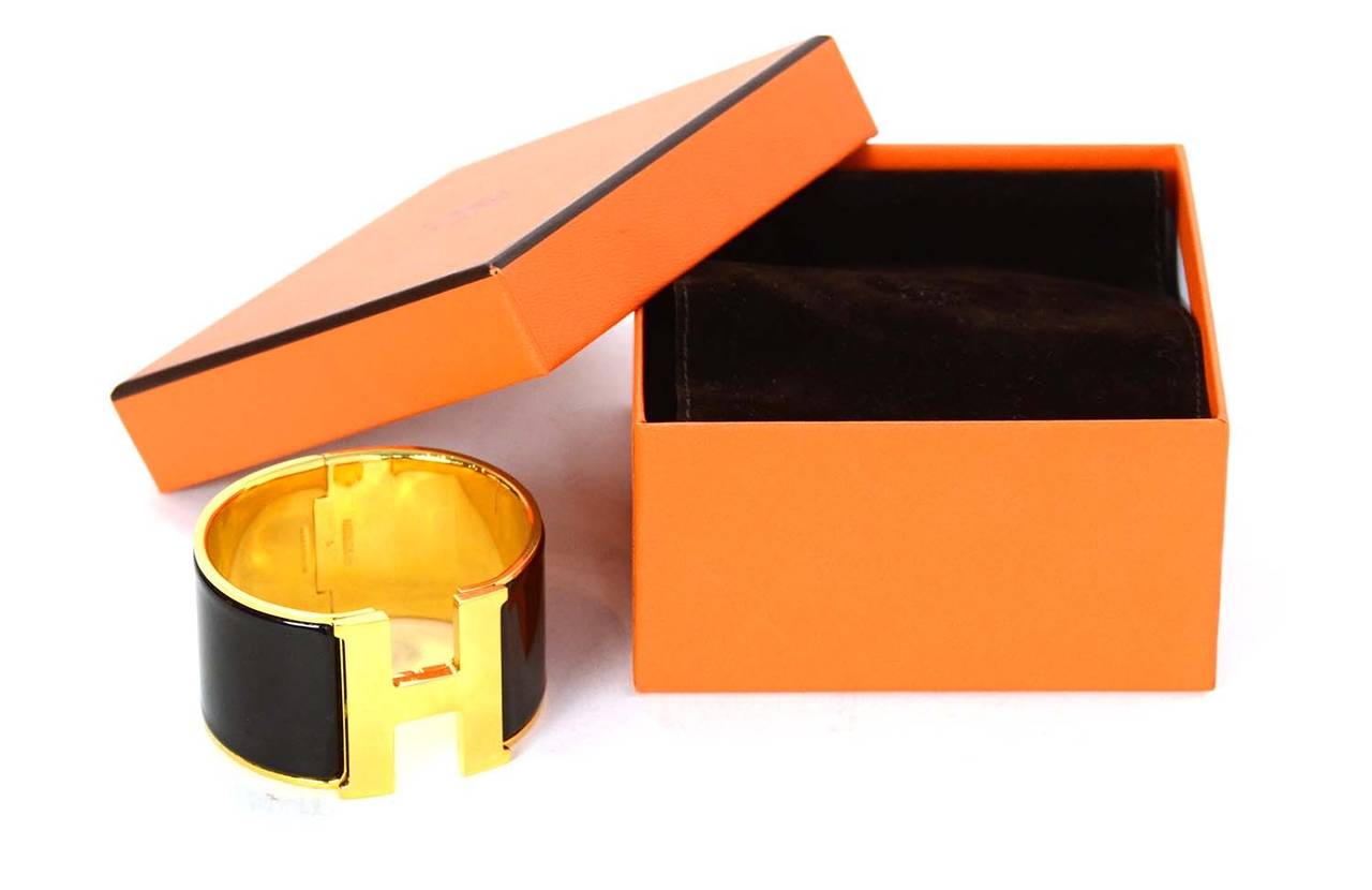 Women's HERMES Black and Gold Extra-Wide Clic-Clac H Bracelet