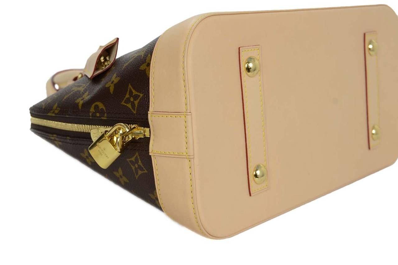Women's or Men's LOUIS VUITTON 2015 Coated Canvas Alma MM Bag rt $1, 810
