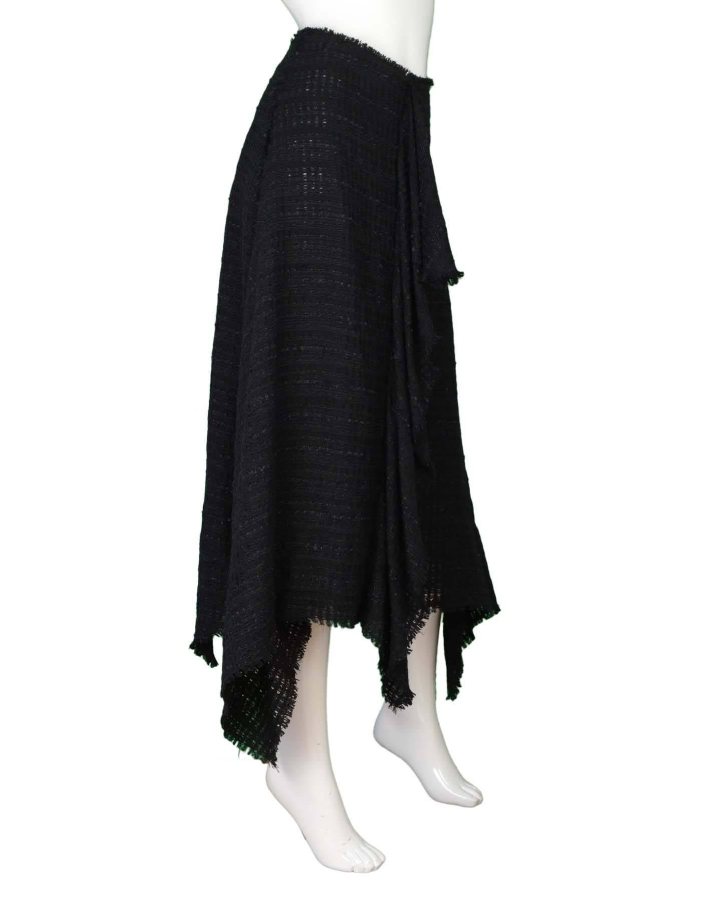 Proenza Schouler Black Tweed Handkerchief Hem Skirt sz 4
Features ruffles down the center, and a midi length handkerchief hem

Made In: China
Color: Black
Composition: 52% Acrylic, 22%nylon, 14% cotton, 12% viscose
Lining: Black 100%