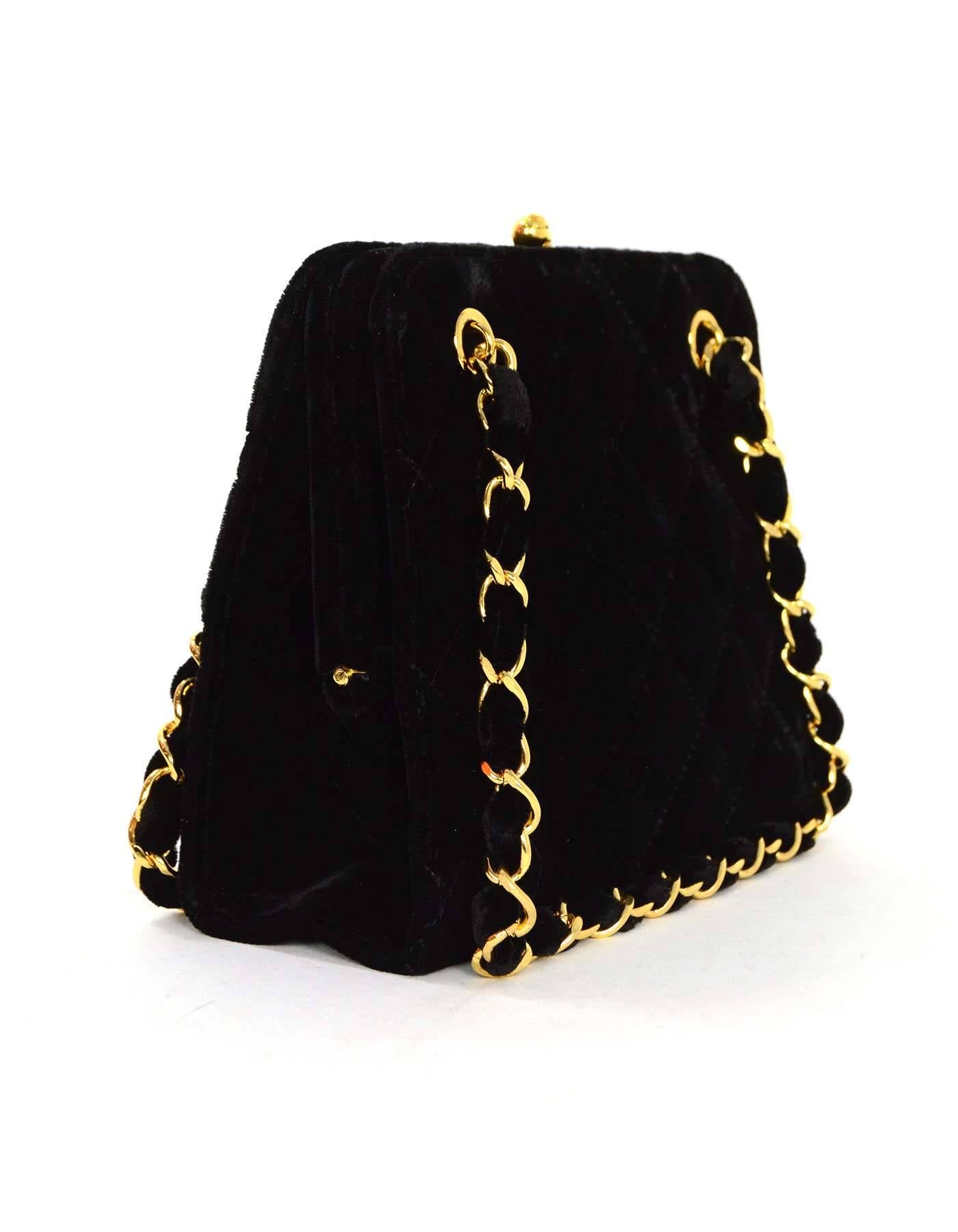 Chanel Vintage 97' Black Velvet Quilted Mini Frame Evening Bag GHW   
Features velvet quilting and kiss lock closure

Made In: Italy
Year of Production: 1996-1997
Color: Black
Hardware: Goldtone
Materials: Velvet and metal
Lining: Gold
