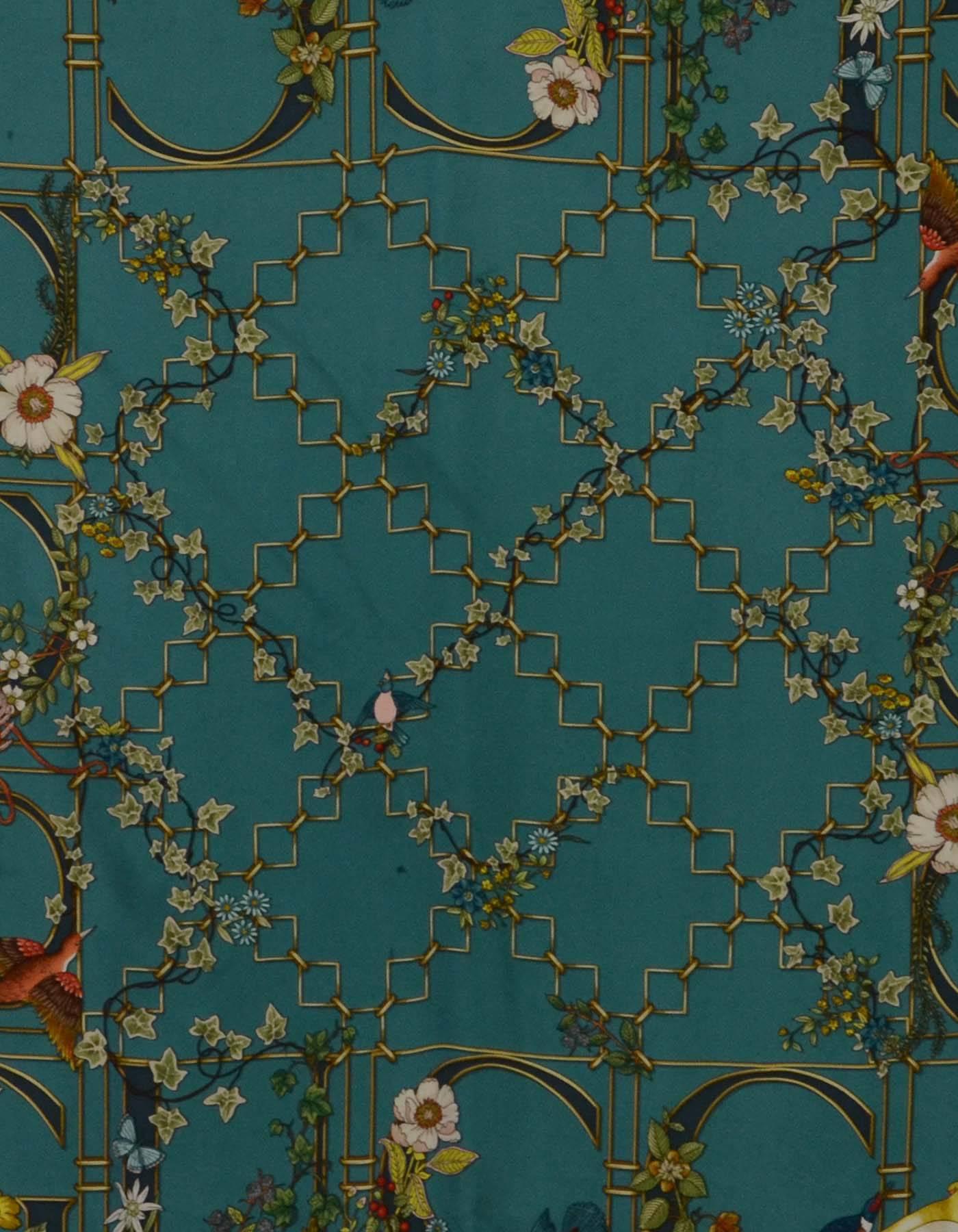 Gucci Turquoise Ivy & Floral Print 90cm Silk Scarf
Features flowers, plants, and birds printed throughout
Made In: Italy
Color: Turquoise, green, brown and burgundy
Composition: 100% silk
Overall Condition: Excellent pre-owned condition with