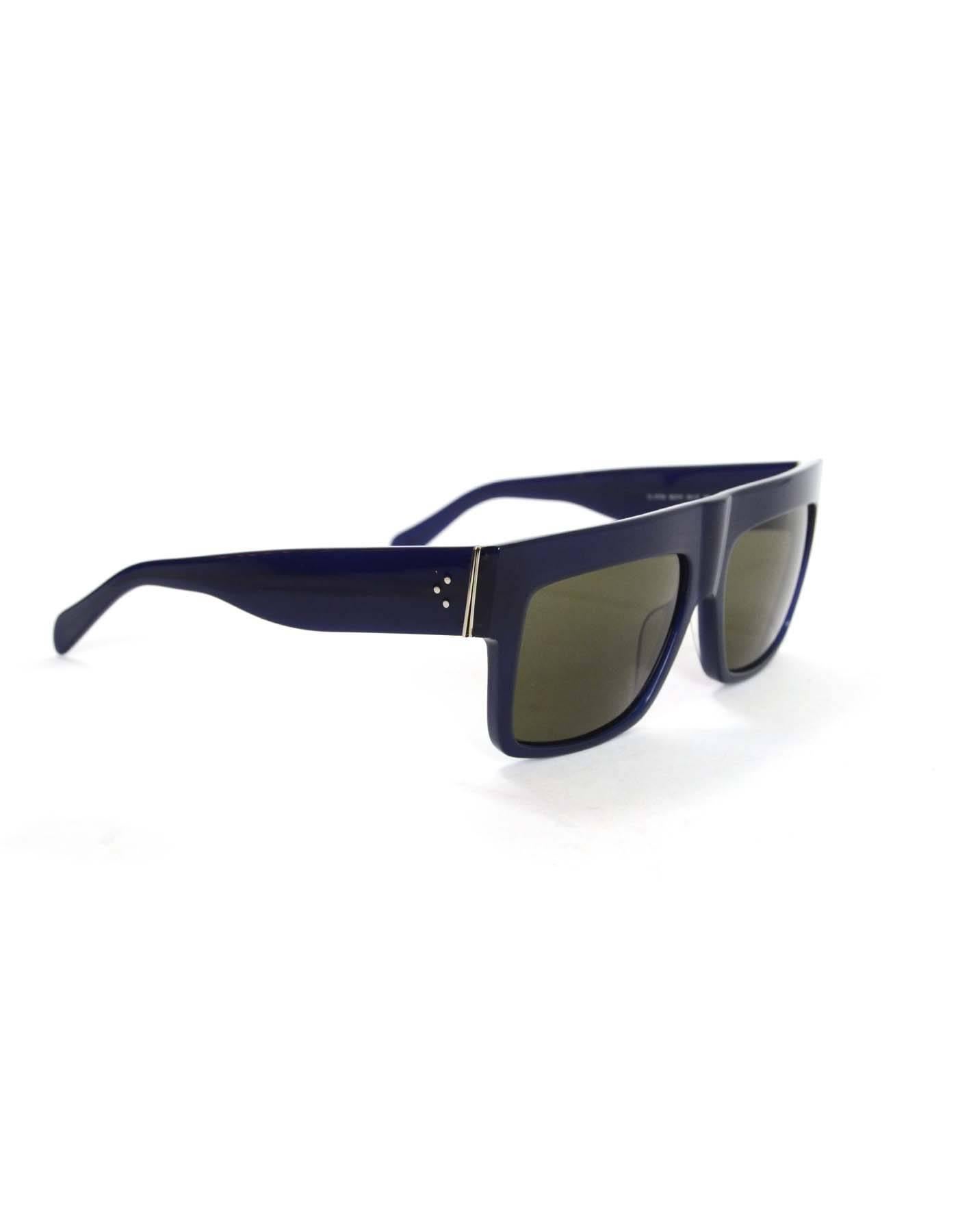 Celine Blue Zz Top Square Sunglasses
Made In: Italy
Color: Blue
Materials: Resin
Stamp: Left arm- CL 41756 M2370 56 17 145< Right arm- Celine Made in Italy
Retail Price: $400 + tax
Overall Condition: Excellent pre owned condition with the