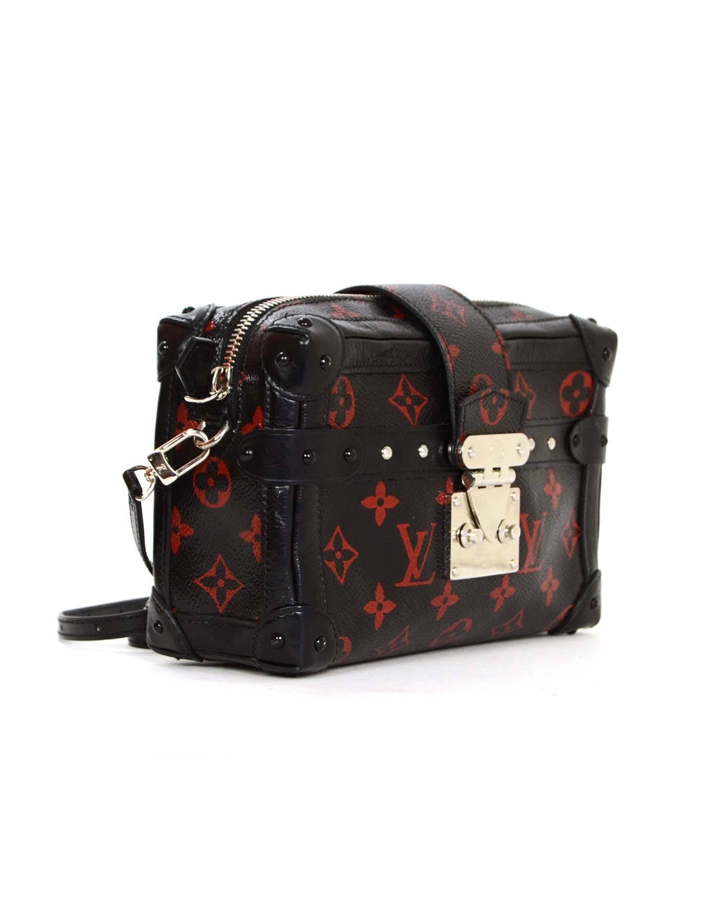 Louis Vuitton Ltd Ed. Petite Malle Monogram Infrarouge MM Bag 
Features soft structure, detachable shoulder/crossbody strap and black calfskin trim

Made In: France
Year of Production: 2015
Color: Red and black
Hardware: Silvertone
Materials: