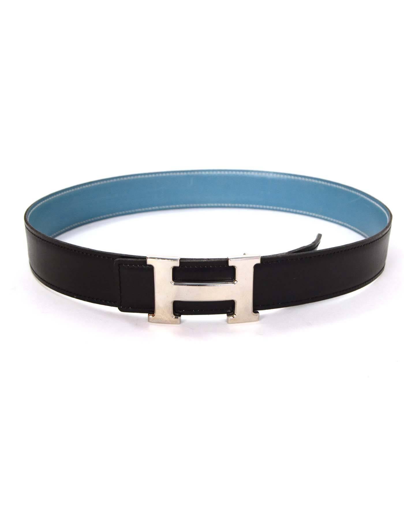 Hermes Vintage '99 Black & Blue Leather H Leather Belt sz 70 PHW
Features ivory contrast stitching on blue side of belt and reversible H buckle

Made In: France
Year of Production: 1999
Color: Black and blue
Materials: Epsom leather and metal