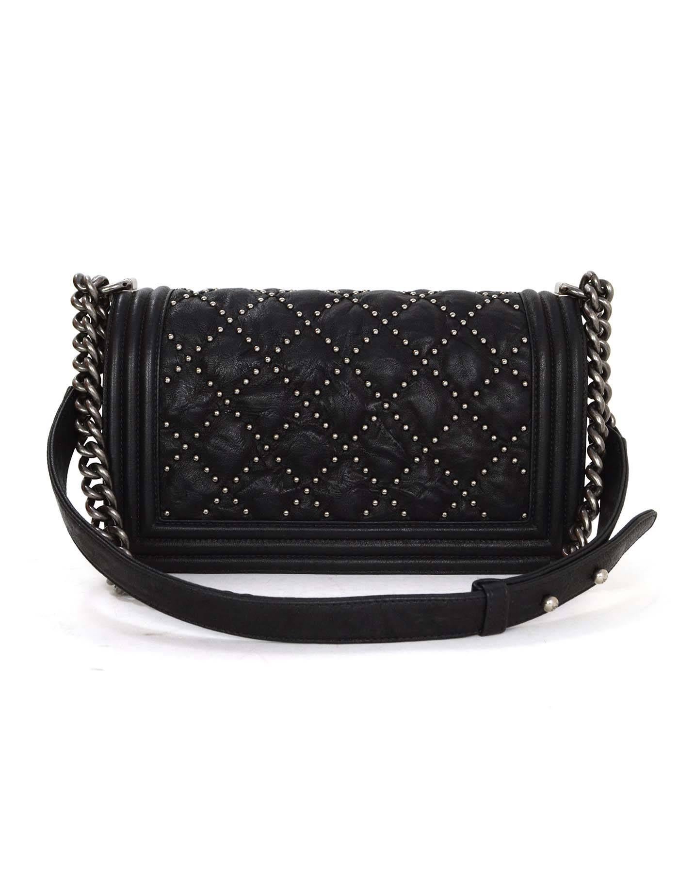 Chanel Black Distressed Leather Studded Medium Boy Bag SHW
Features adjustable shoulder strap and studded quilting throughout

Made In: Italy
Year of Production: 2015
Color: Black 
Hardware: Silvertone
Materials: Calfskin leather and metal