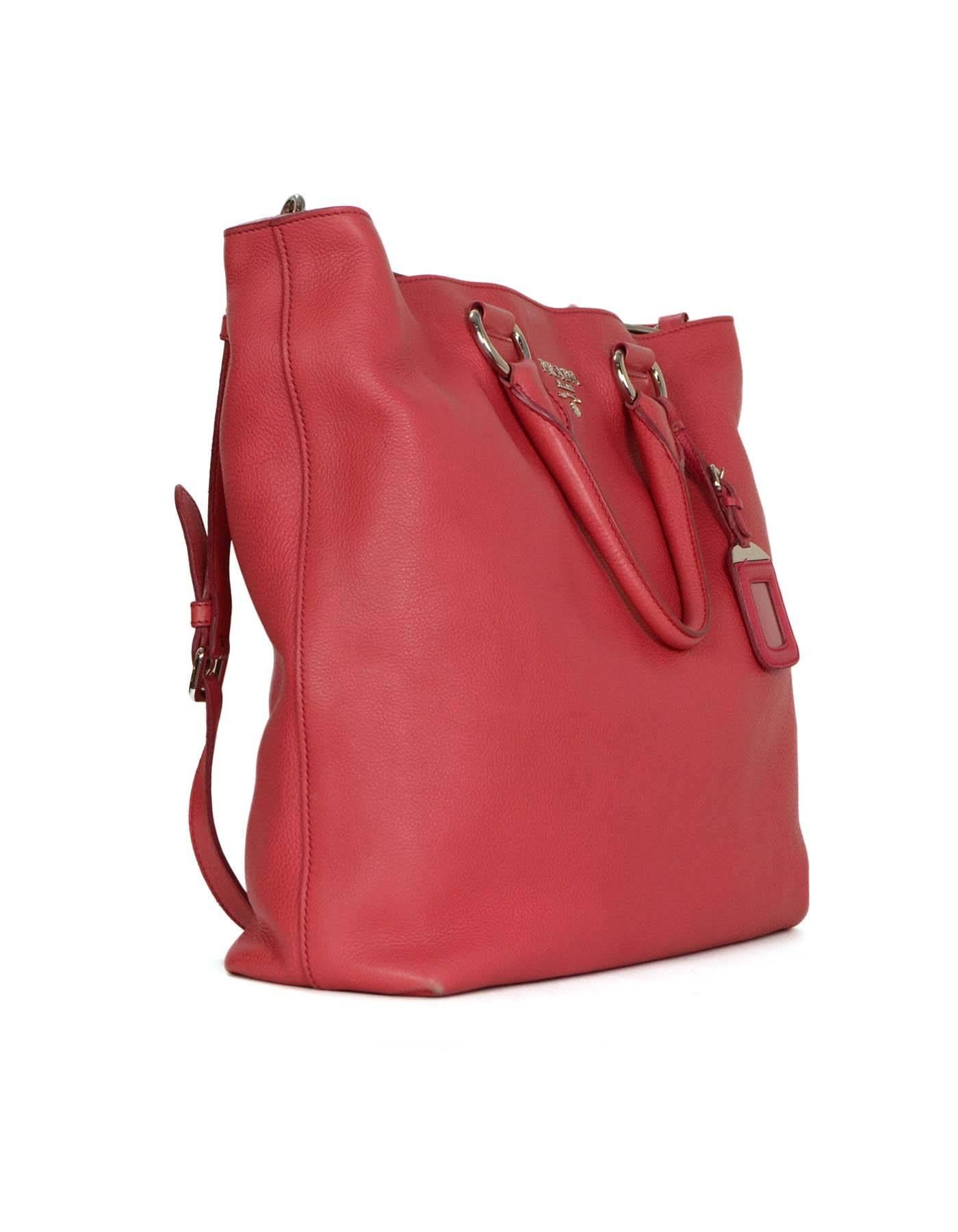 Prada Hot Pink Calfskin Leather Tote SHW
Features silver hardware Prada logo detail at front and optional shoulder strap

Made In: Italy
Color: Hot pink
Hardware: Silvertone
Materials: Leather
Lining: Hot pink textile
Closure/Opening: Open