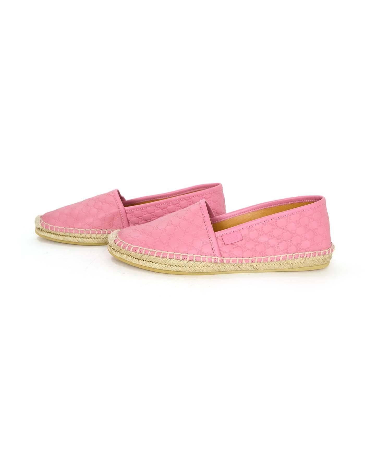 Gucci Pink Microguccissima Espadrilles 
Features Gucci monogram throughout leather
Made In: Spain
Color: Pink and beige
Materials: Leather and jute rope
Closure/Opening: Slide on
Sole Stamp: Gucci Made in Spain
Overall Condition: