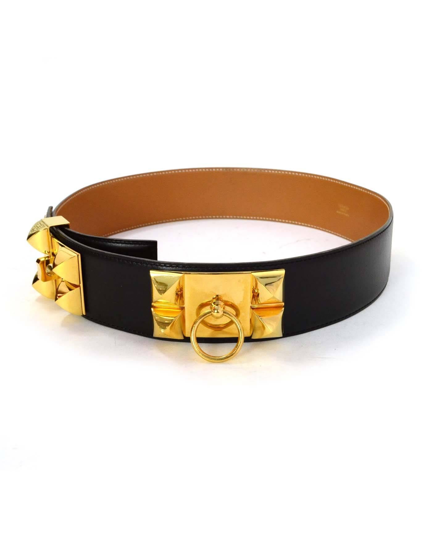 Hermes Vintage Black CDC Belt
Made in: France
Year of Production: 1992
Color: Black and gold
Hardware: Gold plated
Materials: Leather and metal
Opening/Closure: Adjustable slide lock with notches
Stamp: V stamp in circle
Retail Price: $2,350