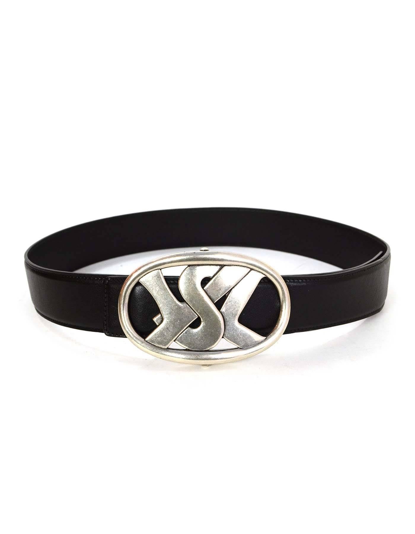 YSL Black Leather Belt 
Features silvertone YSL buckle

Made In: Italy
Color: Black
Hardware: Silvertone
Materials: Leather
Closure/Opening: Stud and notch closure
Stamp: 118577-214351-80-32
Overall Condition: Excellent pre-owned condition