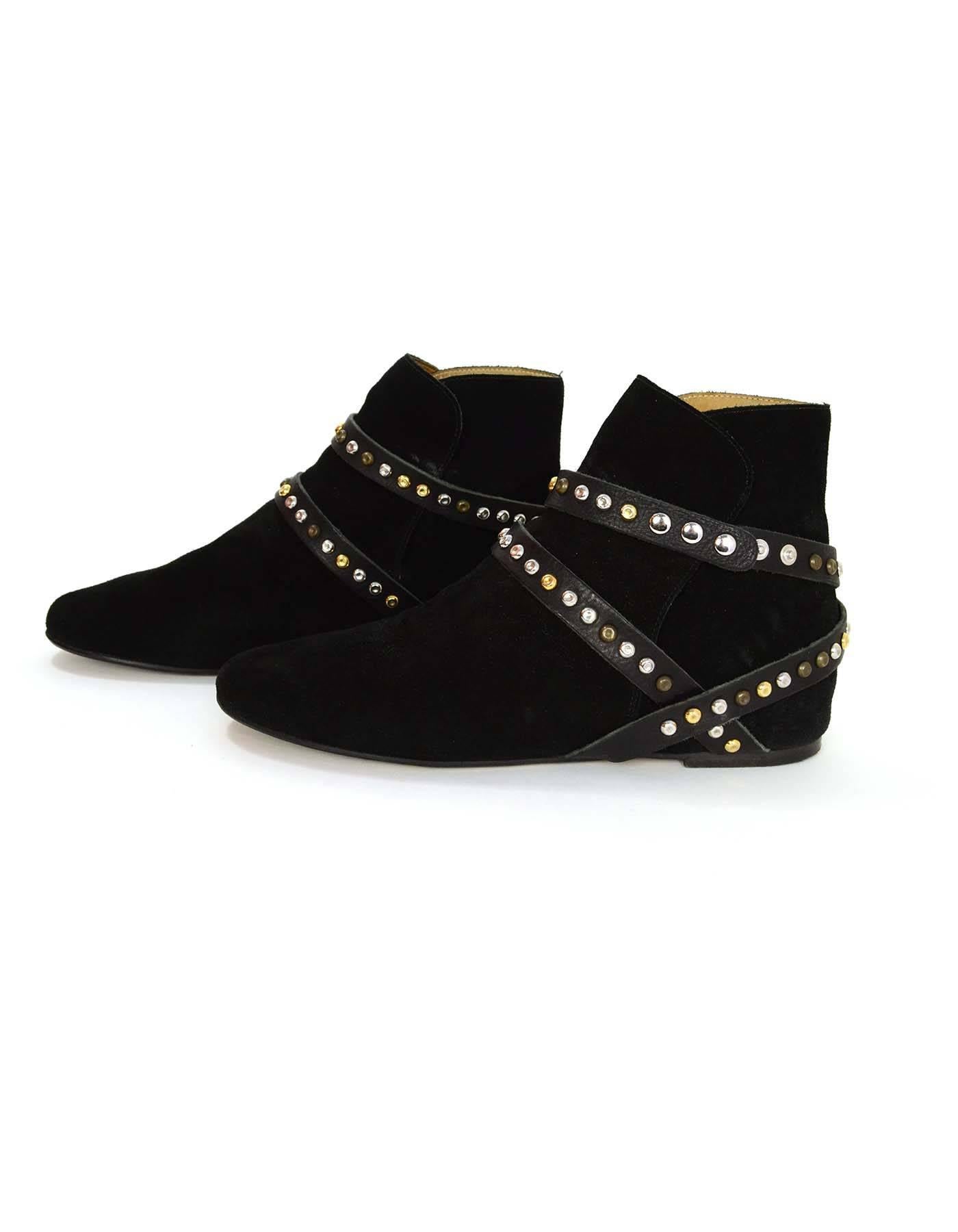 Isabel Marant Suede Ruben Ankle Boots 
Features gold, silver and copper studded wrap around leather straps
Made In: Italy
Color: Black
Materials: Suede, leather and metal
Closure/Opening: Pull on
Sole Stamp: Isabel Marant Etoile Made in Italy