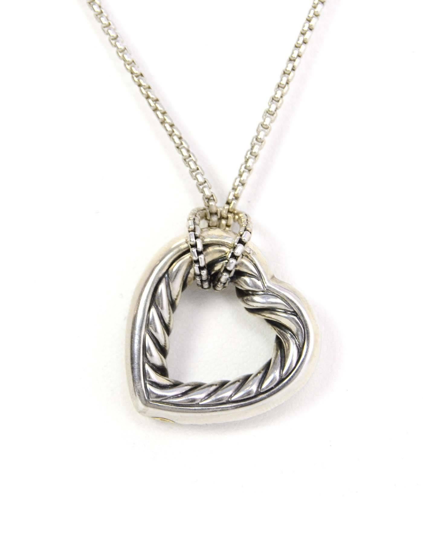 David Yurman Sterling & 18k Heart Pendant Necklace
Features large sculpted heart pendant
Color: Silver and gold
Materials: Sterling and 18k gold
Closure: Lobster claw clasp
Stamp: DY 925 750
Retail Price: $395 + tax
Overall Condition: