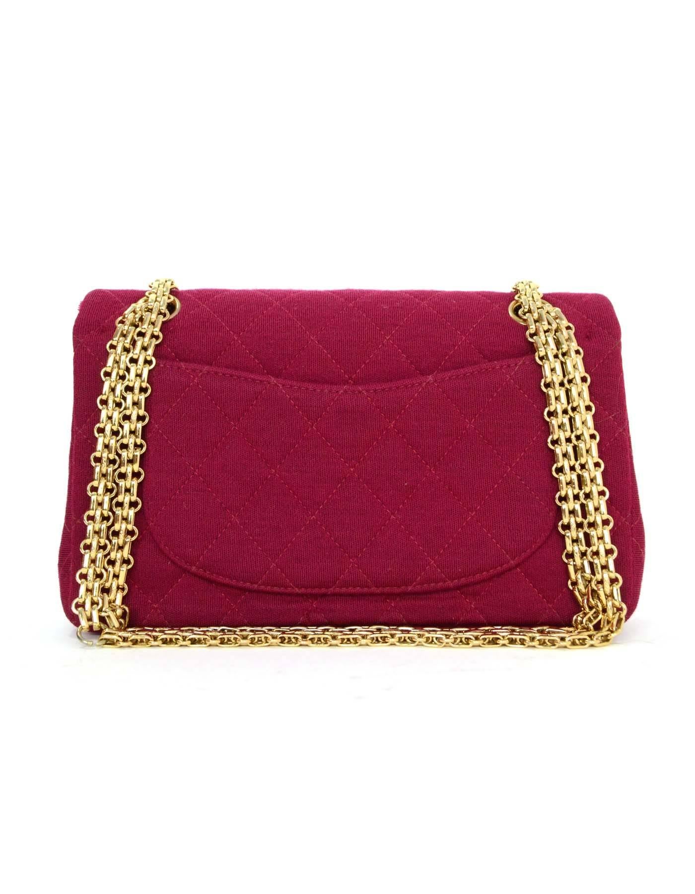 Chanel Burgundy Jersey Double Flap Small Classic Bag GHW
Features adjustable mademoiselle chain shoulder straps

Made In: France
Year of Production: 2002
Color: Burgundy
Hardware: Goldtones
Materials: Jersey textile
Lining: Burgundy