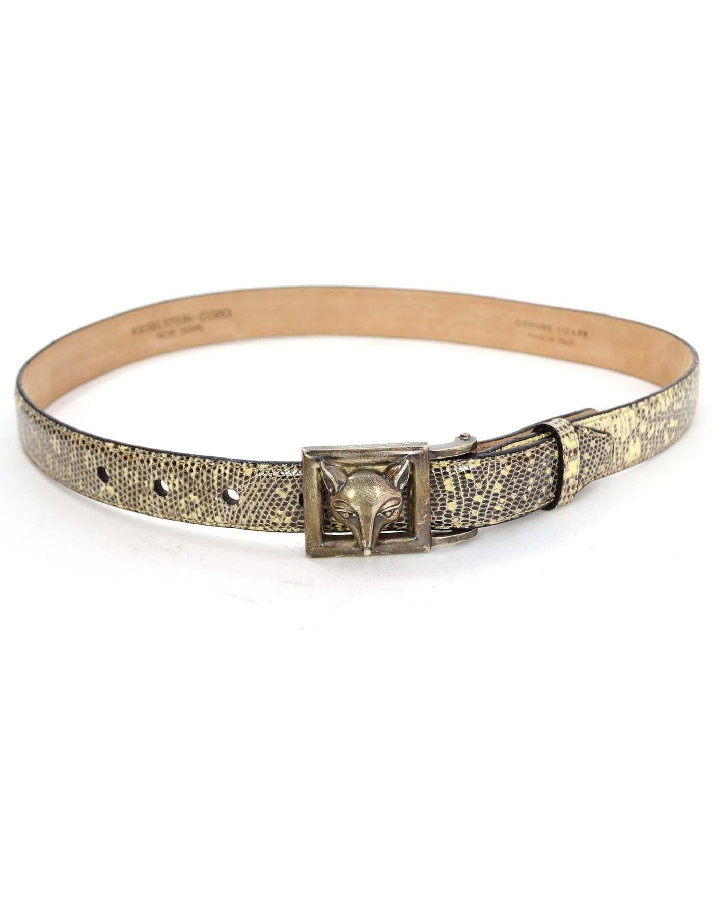 Kieselstein-Cord Lizard Skin Belt Strap 
**Note: Does NOT include belt buckle**
Made In: Italy
Color: Black and cream
Hardware: Black and silvertone
Materials: Lizard skin
Closure/Opening: Double snap button closure
Stamp: Kieselstein-Cord