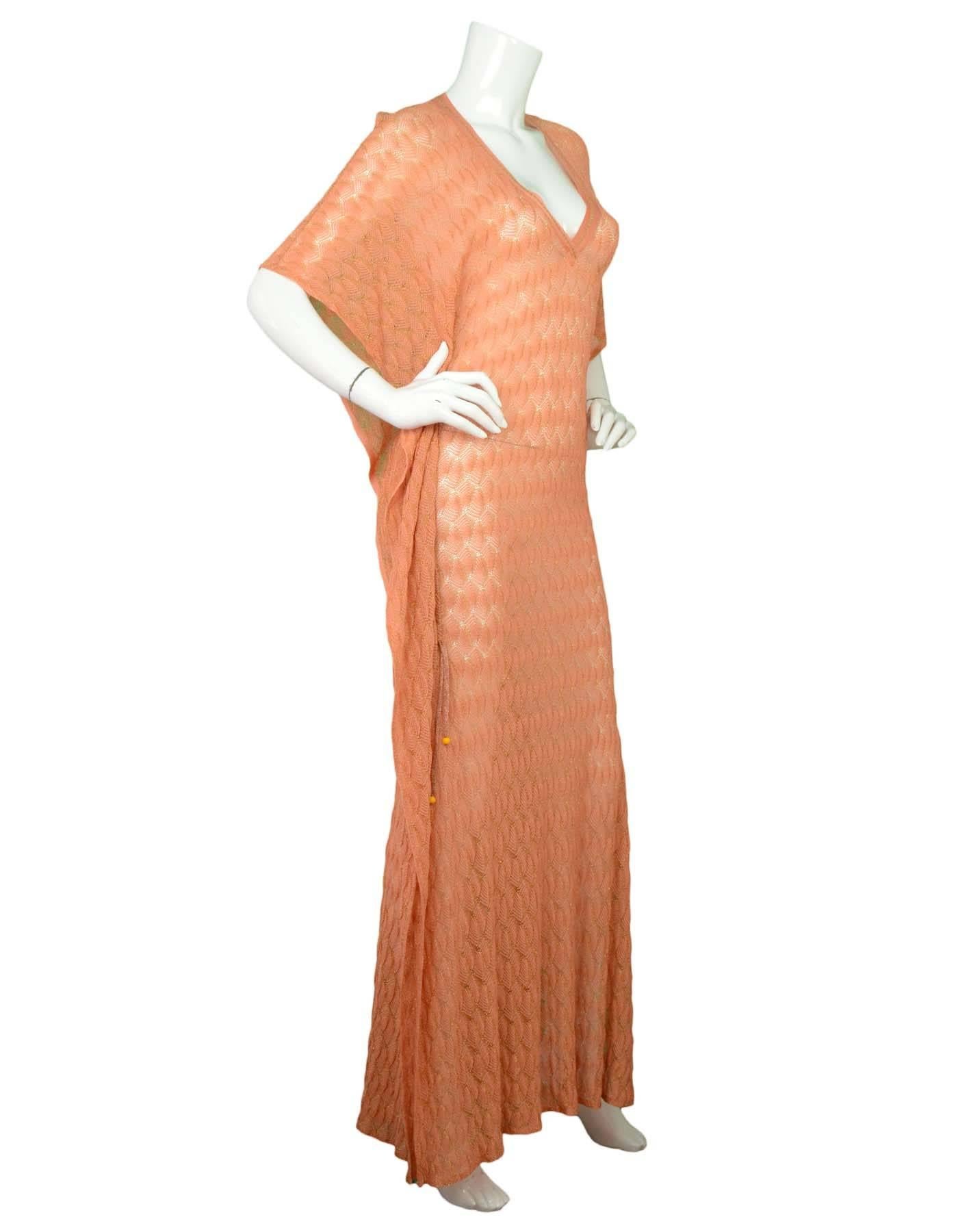 Missoni Peach & Gold Kaftan sz 42
Features a deep V-neck line with dual sided drawstrings that allows a ruching effect
Made In: Italy
Color: Peach and gold 
Composition: Knit textile
Lining: None
Closure/Opening: Pull over
Exterior Pockets: