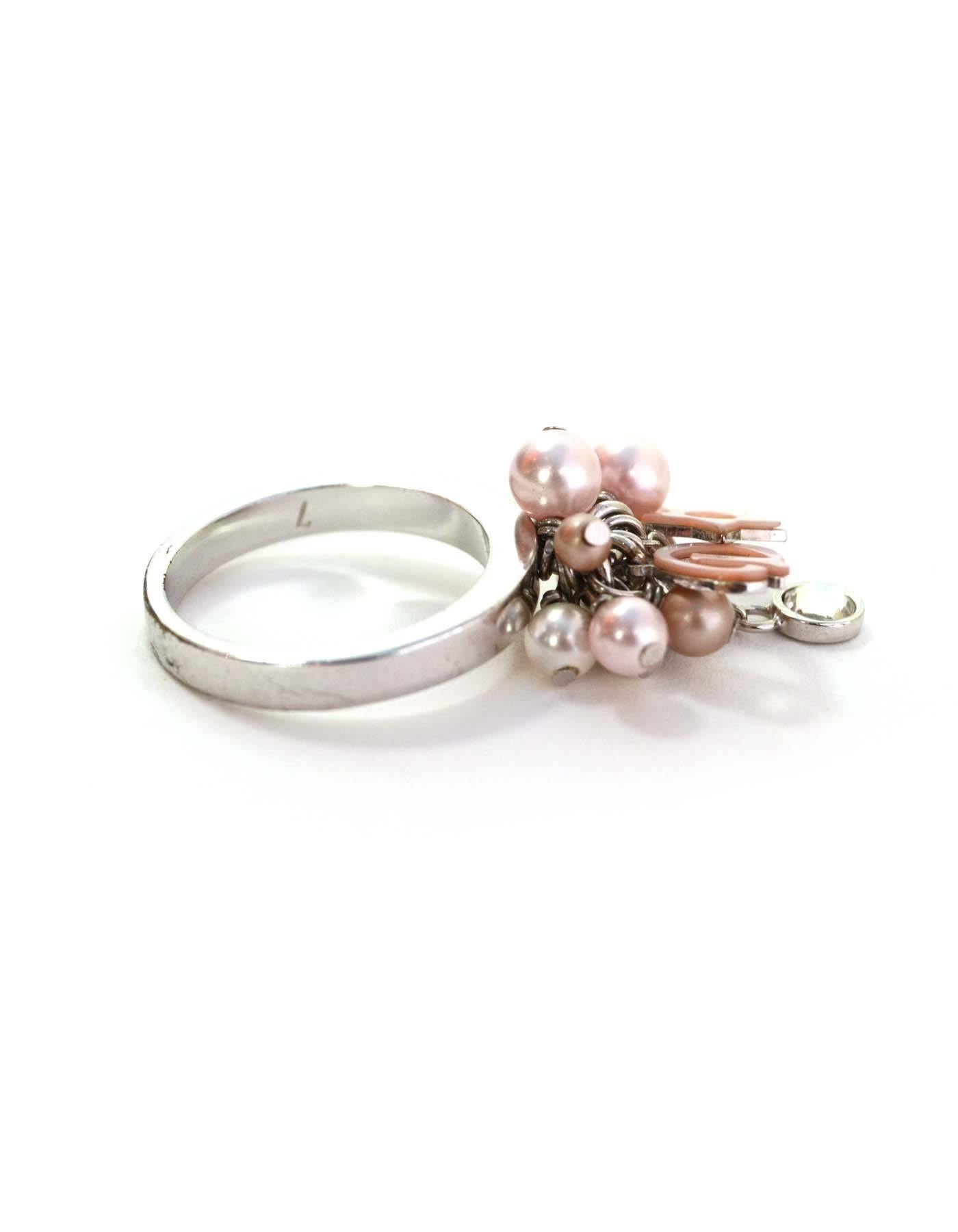 Christian Dior Pink Pearl and Charm Cluster Ring
Features pink, mauve and ivory faux pearl charms, pink 