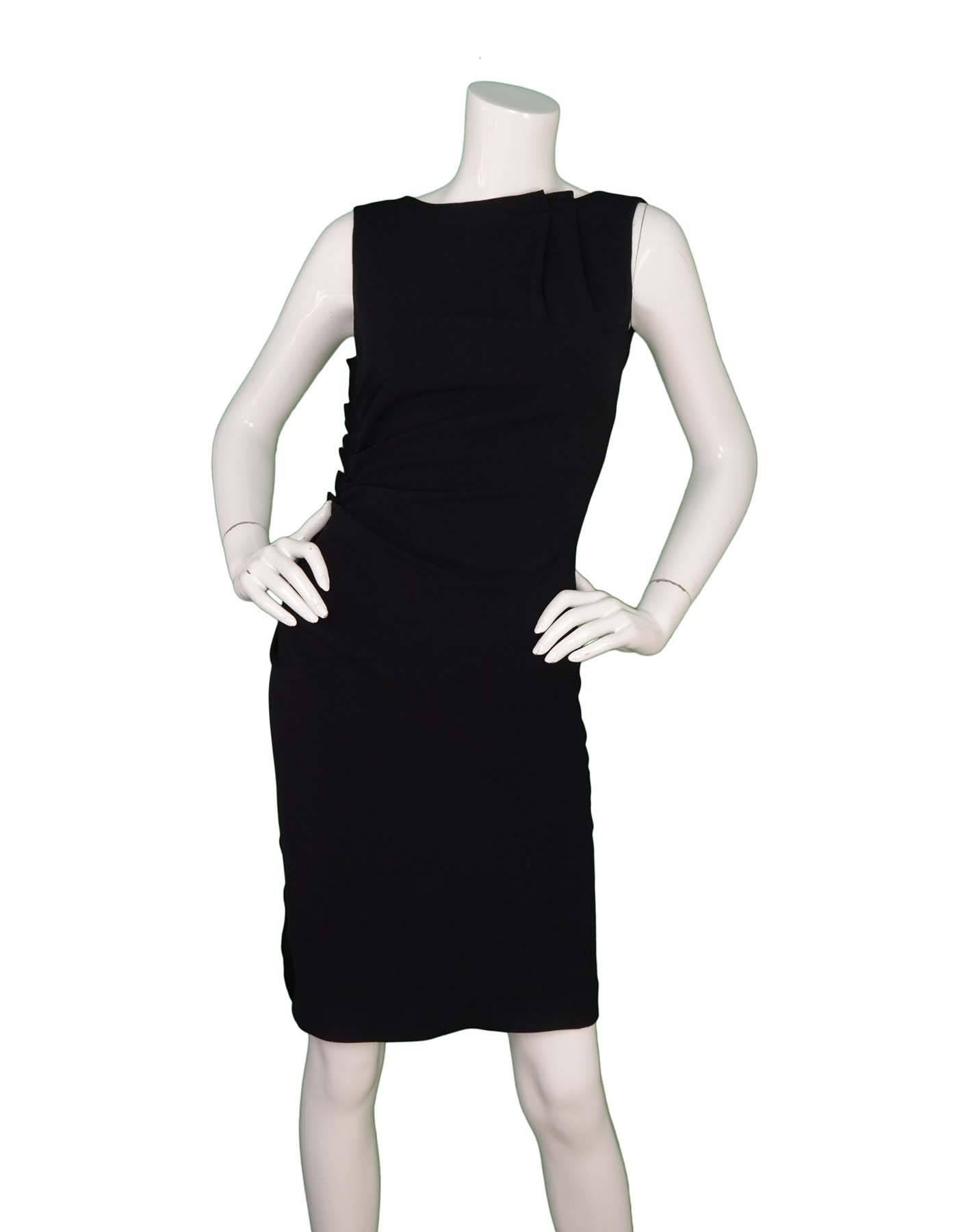 Christian Dior Black Sleeveless Ruched Dress sz 6
Features ruched detailing at neckline and at right side seam
Made In: Italy
Color: Black
Composition: 57% Acetate and 43% viscose
Lining: 100% Silk
Closure/Opening: Back zipper closure