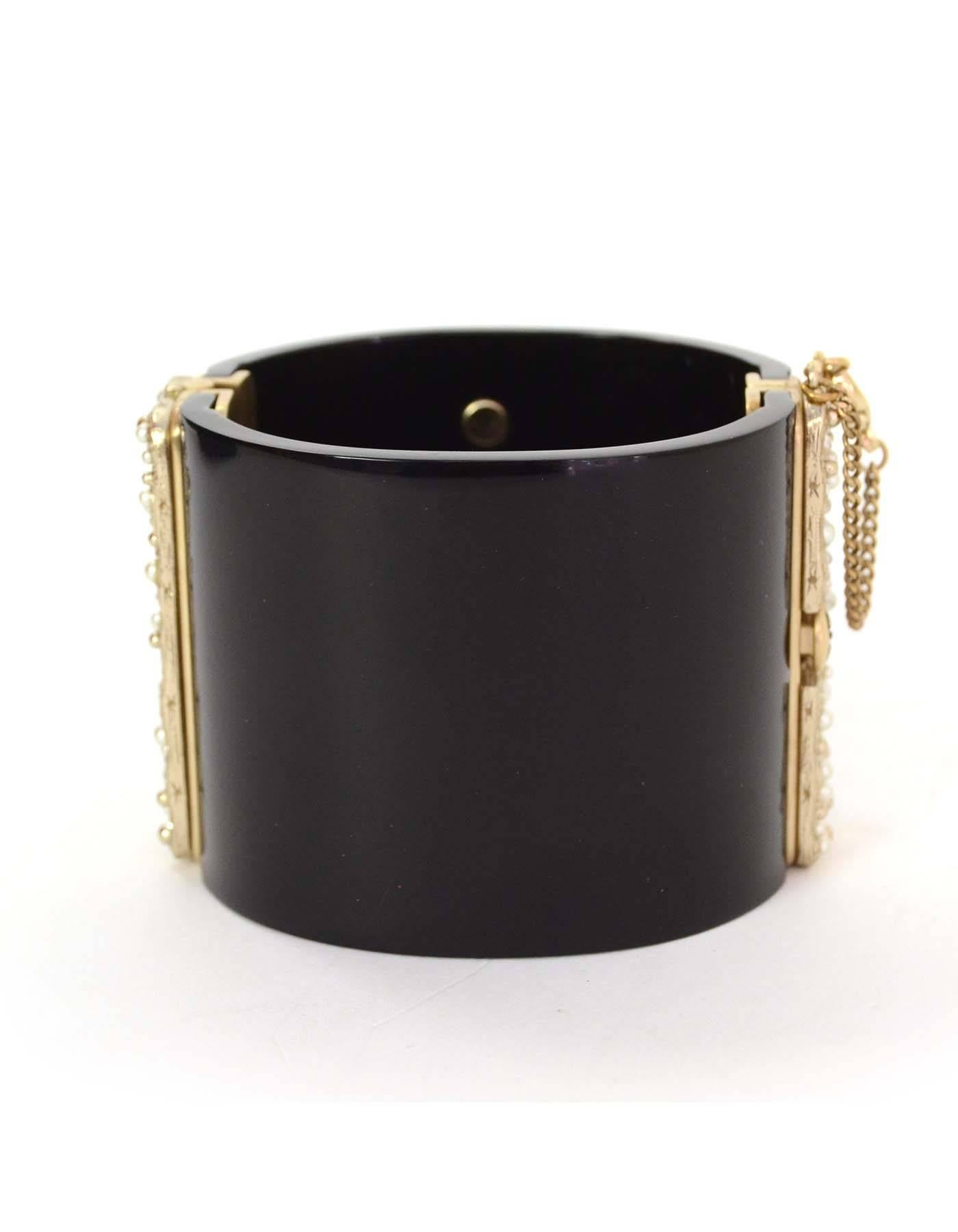 Chanel Black Resin & Textured Gold Camelia Cuff Bracelet In Excellent Condition In New York, NY