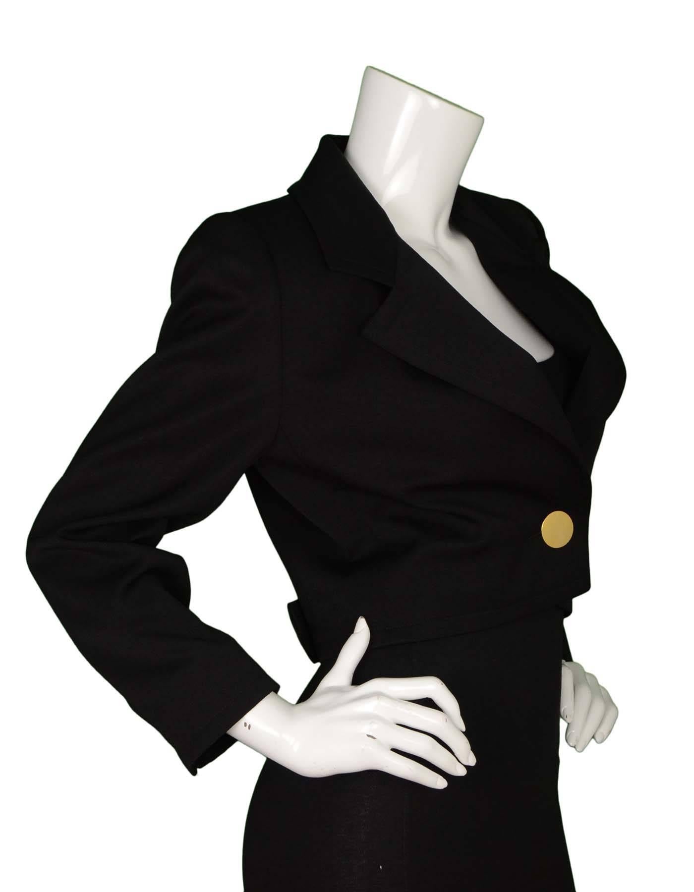 Givenchy Vintage Black Cropped Jacket 
Features padding in shoulders and one large goldtone button
Made In: France
Color: Black
Composition: Believed to be a wool-blend
Lining: Black, silk-blend
Closure/Opening: One front button
Exterior