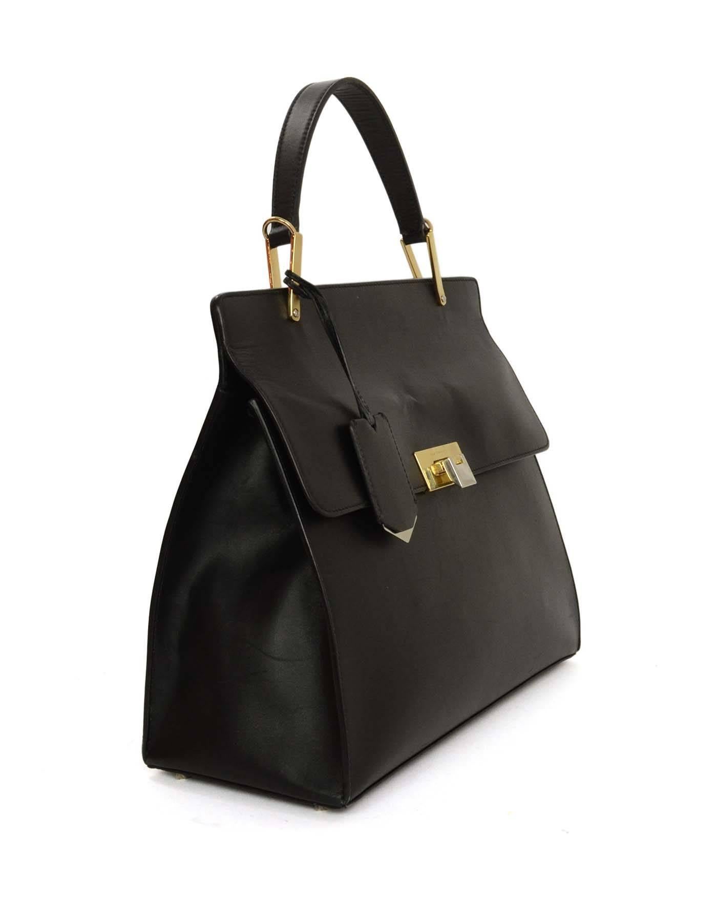 Balenciaga Black Le Dix Cartable M Satchel Bag GHW
Features flap style with removable mirror tag

Year of Production: 2013
Made In: Italy
Color: Black
Hardware: Gold/silvertone combo
Materials: Calfskin leather
Lining: Black