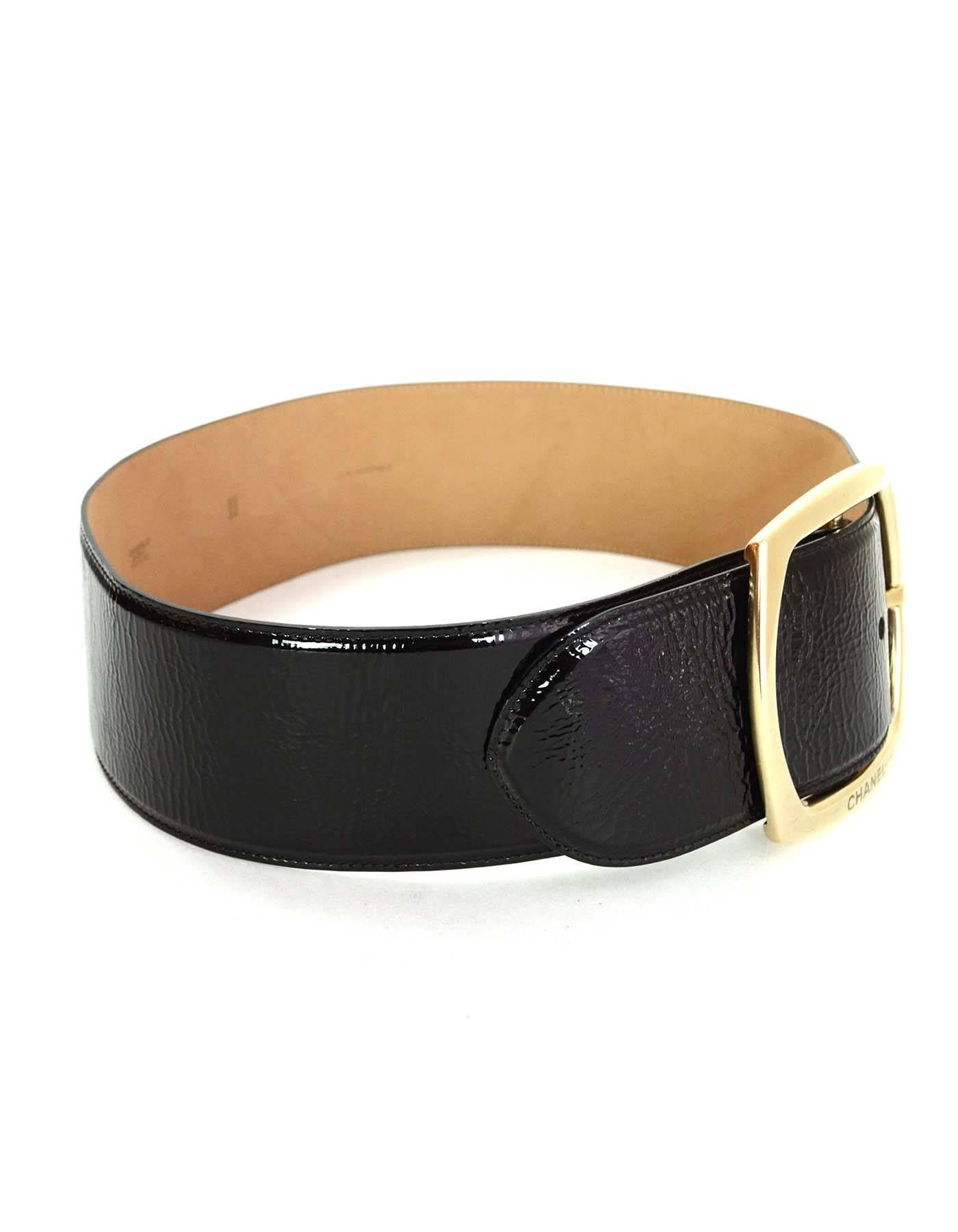 Chanel Black Patent Extra Wide Belt sz 85
Features extra large goldtone buckle

Made In: Italy
Year of Production: 2008
Color: Black and goldtone
Materials: Metal and patent leather
Closure: Buckle and notch closure
Stamp: 08 CC C 
Overall