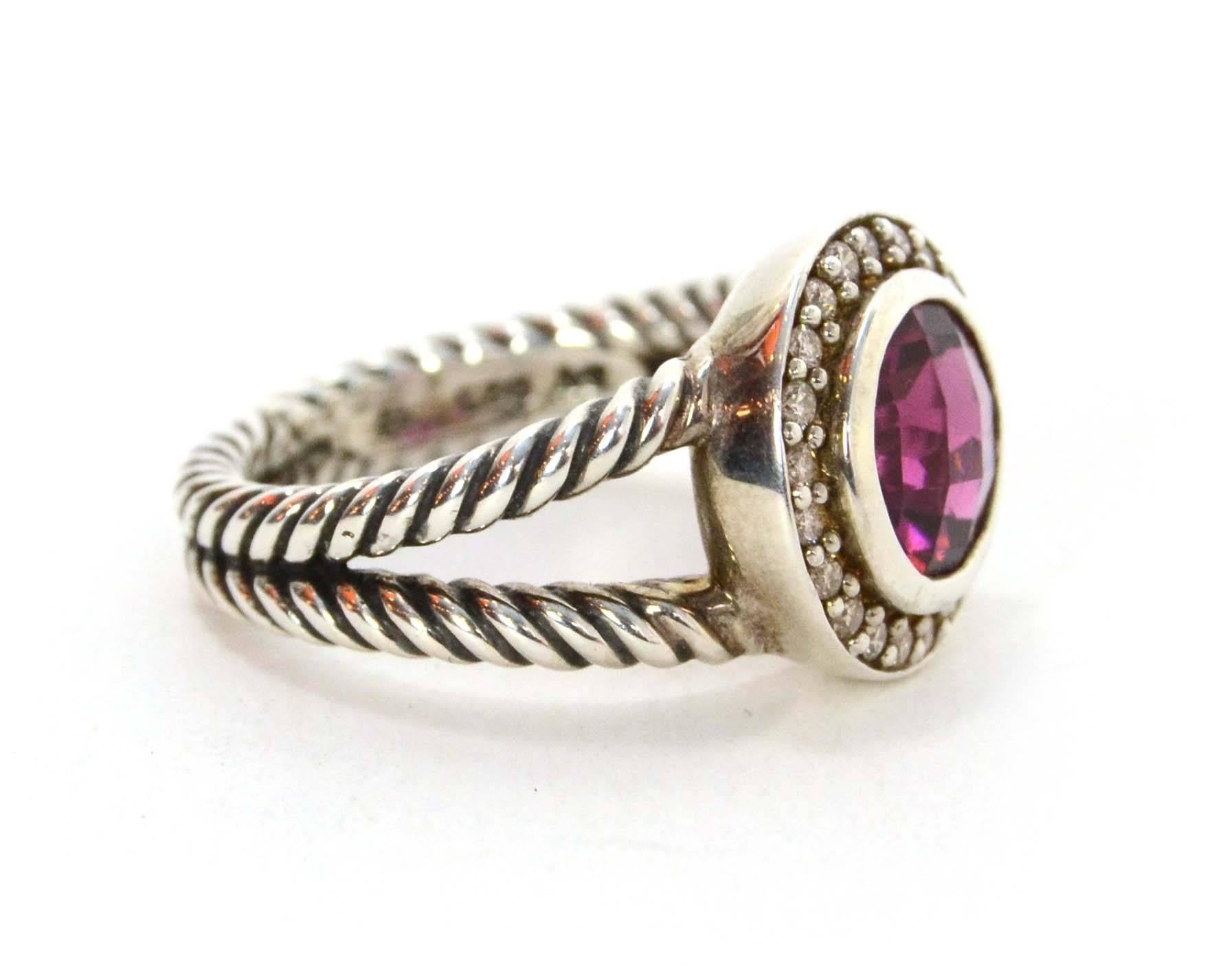 David Yurman Diamond & Sterling Cerise Ring 
Features pale purple center stone surrounded by small diamonds
Color: Silver and pale purple
Materials: Sterling silver, diamond and stone
Closure: None
Stamp: 925
Retail Price: $675 + tax
Overall