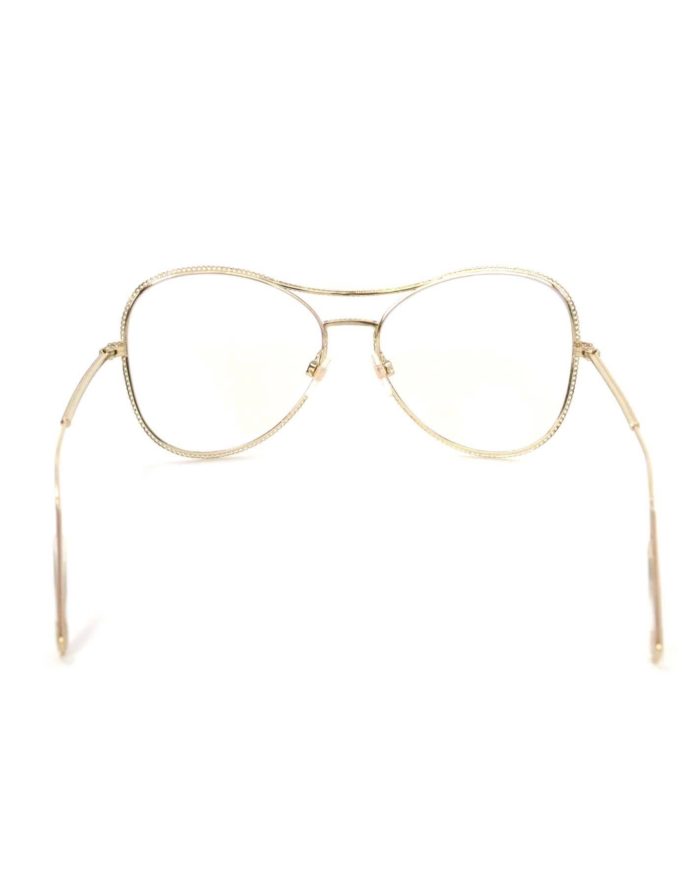 Oro Occhiali da sole Aviator di Chanel in oro chiaro a catena