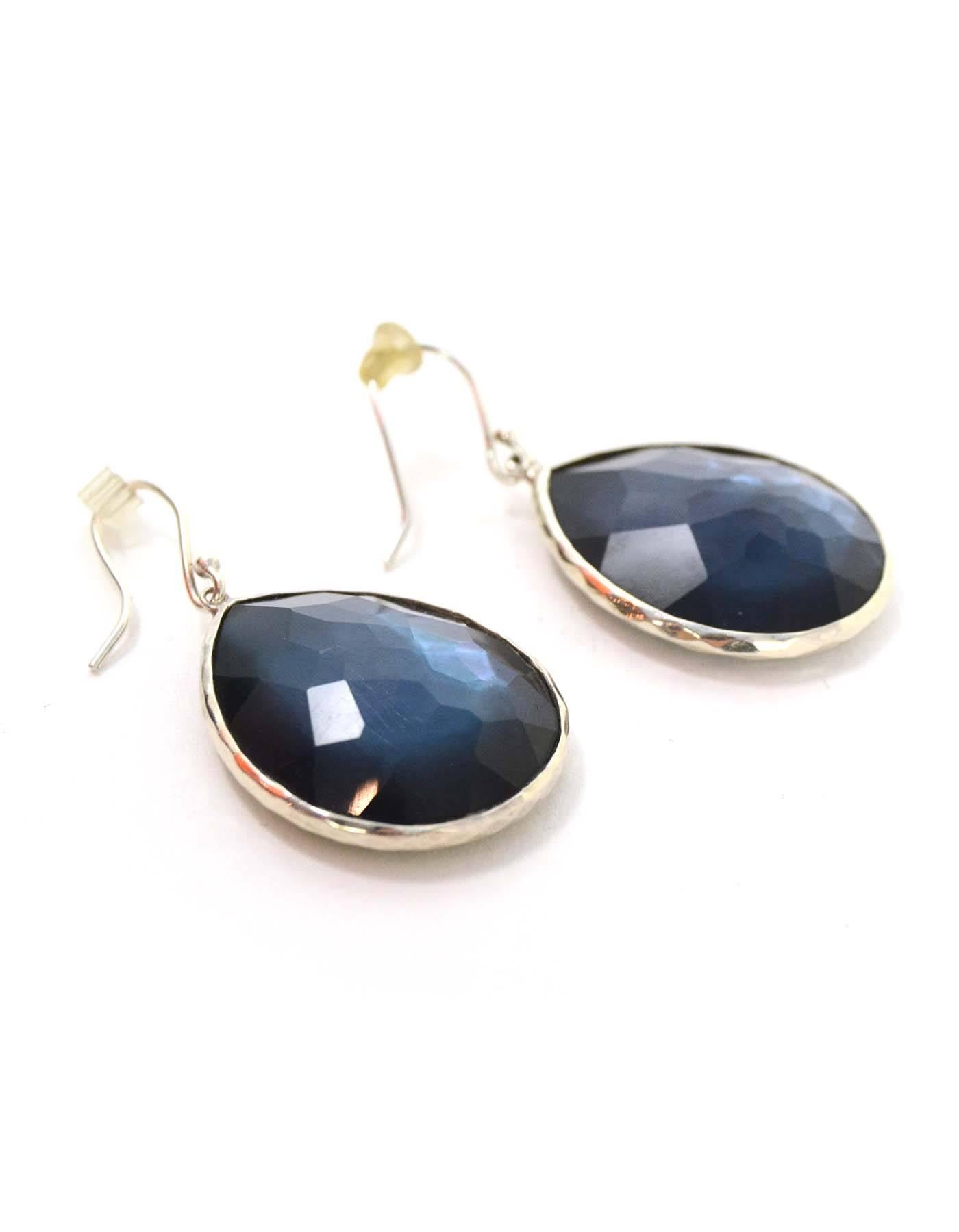 Ippolita 'Rockcandy' Topaz Sterling Earrings
Features translucent London Blue Topaz
Color: Topaz blue and silver
Materials: Sterling silver and topaz
Closure: Fish hook with rubber back 
Stamp: Ippolita 925
Retail Price: $995 + tax
Overall