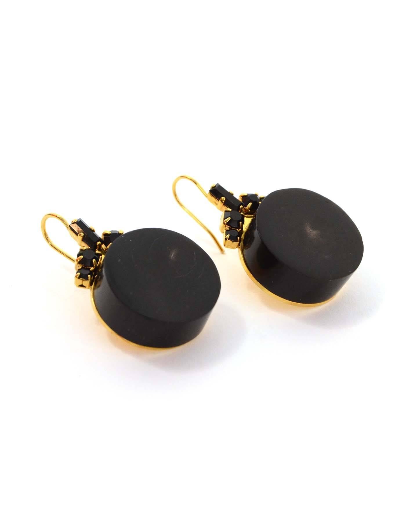 Marni Black & Gold Drop Earrings 
Features black baguette crystals at top with black wood-printed resin cylinders below

Color: Black
Hardware: Goldtone
Materials: Metal and resin
Closure: Pierced back hook- no closure
Stamp: Marni
Overall