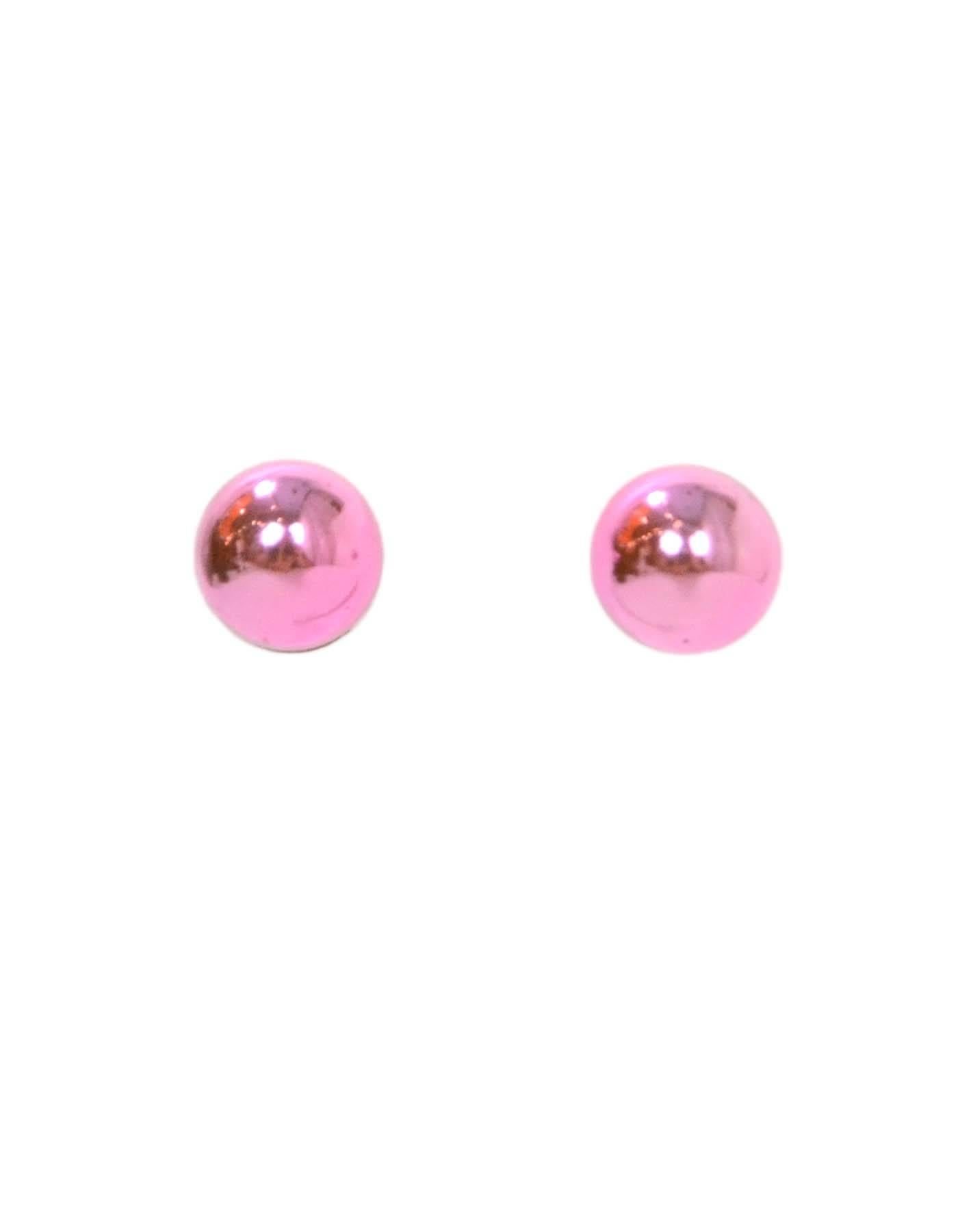 Dior Metallic Pink Miss en Dior Tribal Earrings

Color: Metallic pink
Hardware: Silvertone
Materials: Metal and enamel
Closure: Pierced back with smaller metallic pink ball at end
Stamp: Dior
Overall Condition: Excellent pre-owned