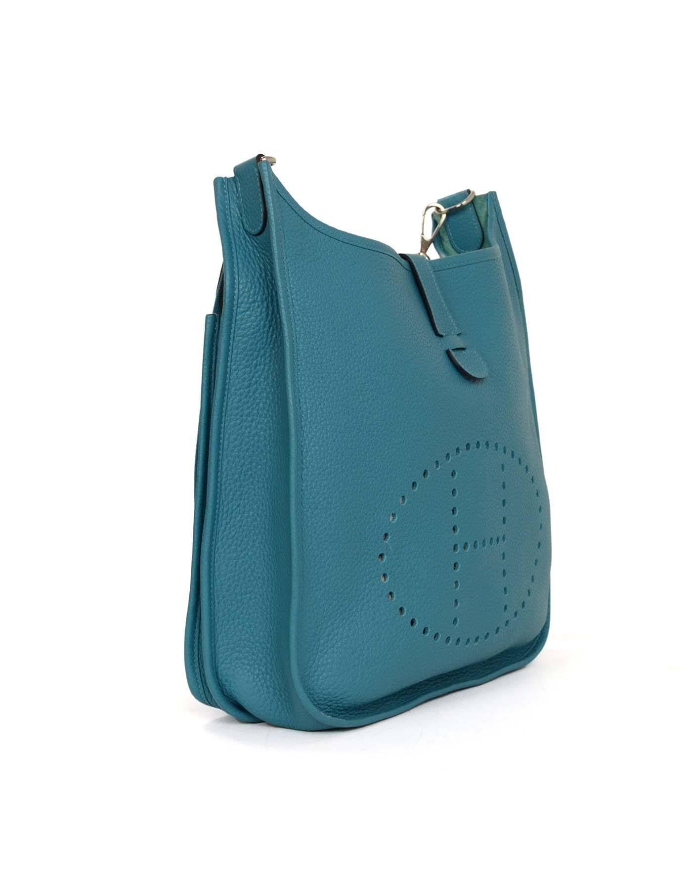 Hermes Turquoise Clemence Evelyne III GM Crossbody Bag 
Features perforated H on front panel of bag and adjustable shoulder/crossbody strap
Made In: France
Year of Production: 2014
Color: Turquoise
Hardware: Palladium
Materials: Clemence