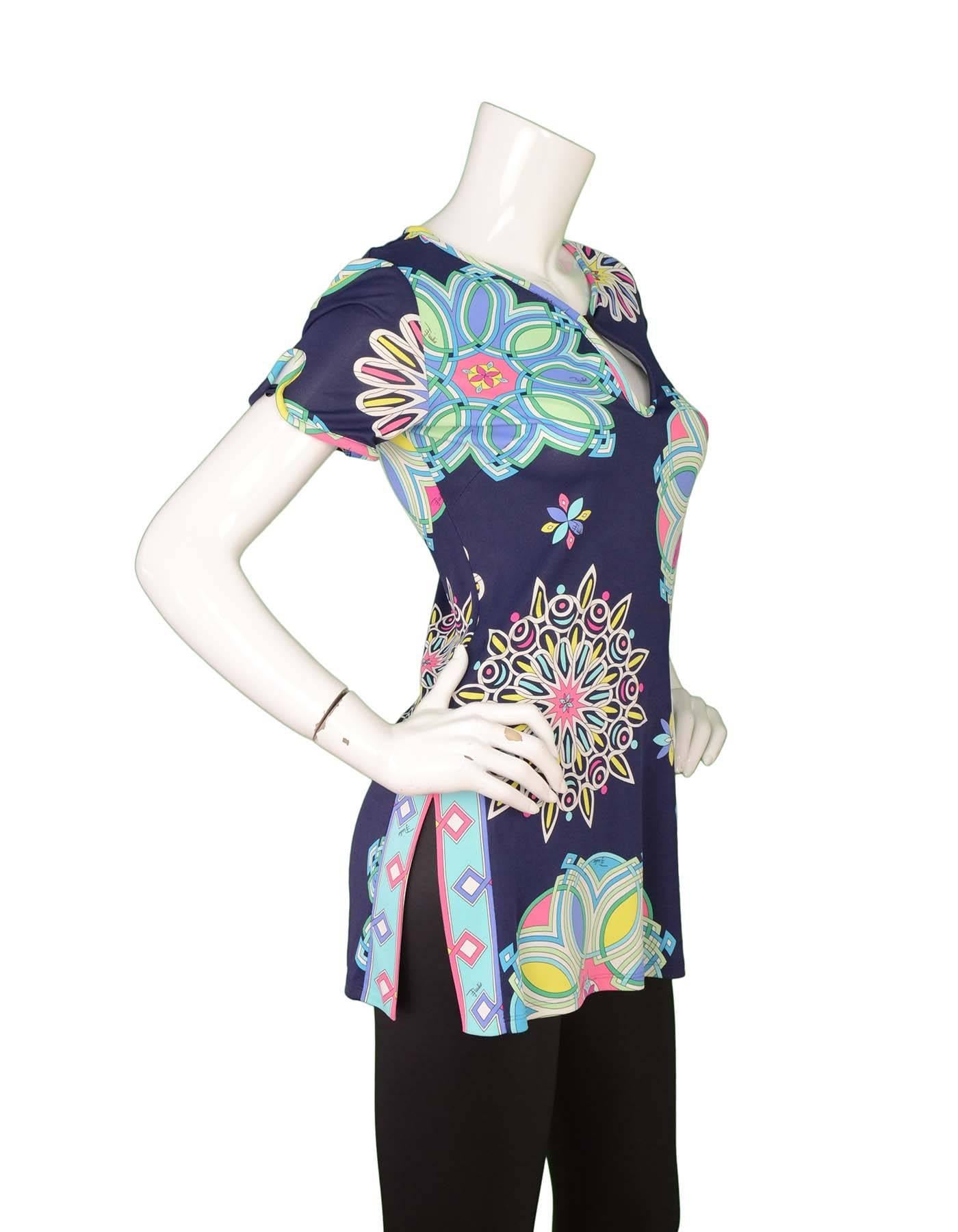 Emilio Pucci Navy Starburst Printed Tunic 
Features multi-colored starburst print throughout
Made In: Italy
Color: Navy, white, pink, teal, green
Composition: 100% viscose
Lining: None
Closure/Opening: Pull over
Exterior Pockets: