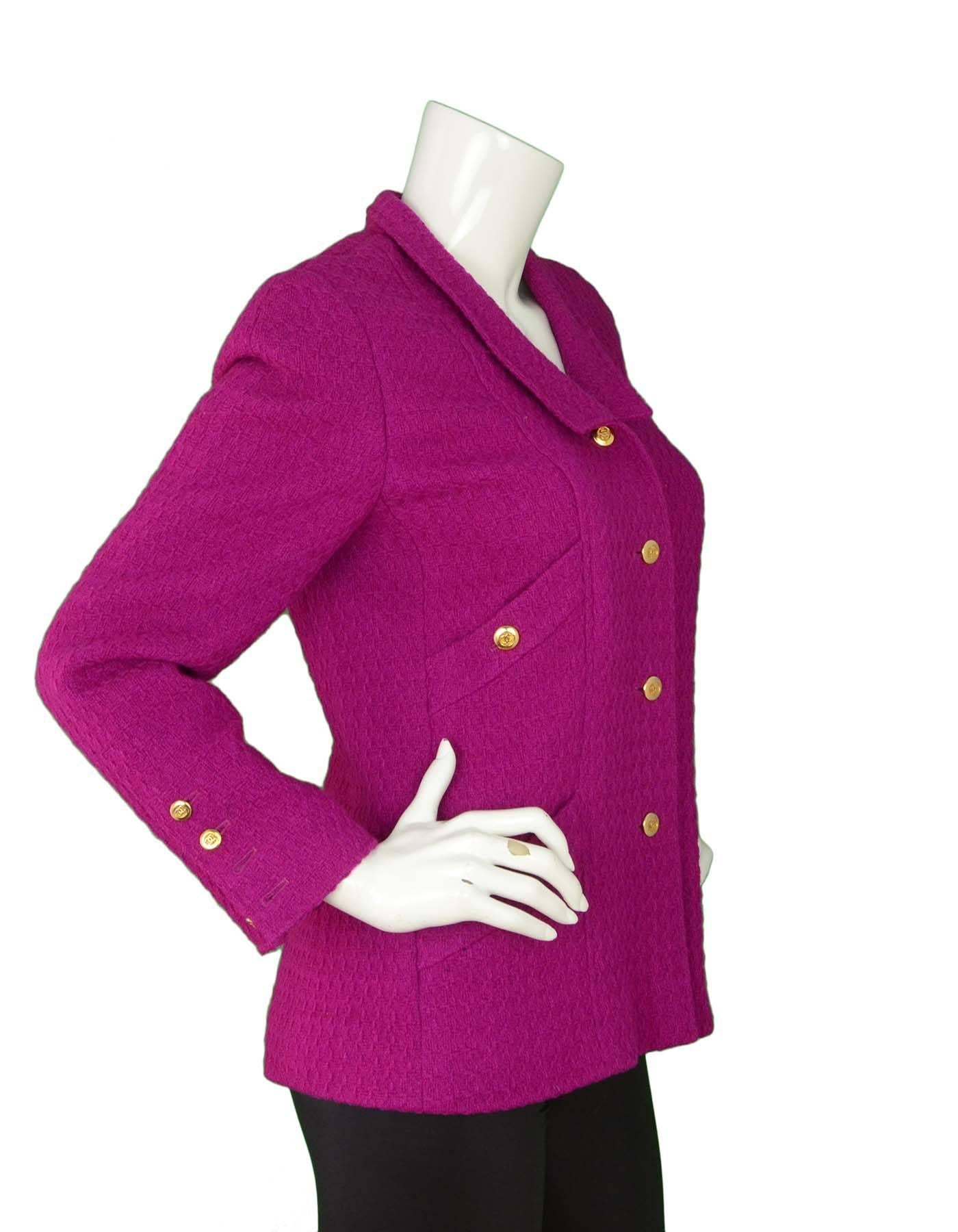 Chanel Fuchsia Wool Jacket
Color: Fuchsia
Composition: Believed to be a wool-blend
Lining: Fuchsia, Silk-blend
Closure/Opening: Button down front
Exterior Pockets: Two breast pockets and two hip pockets
Interior Pockets: None
Overall