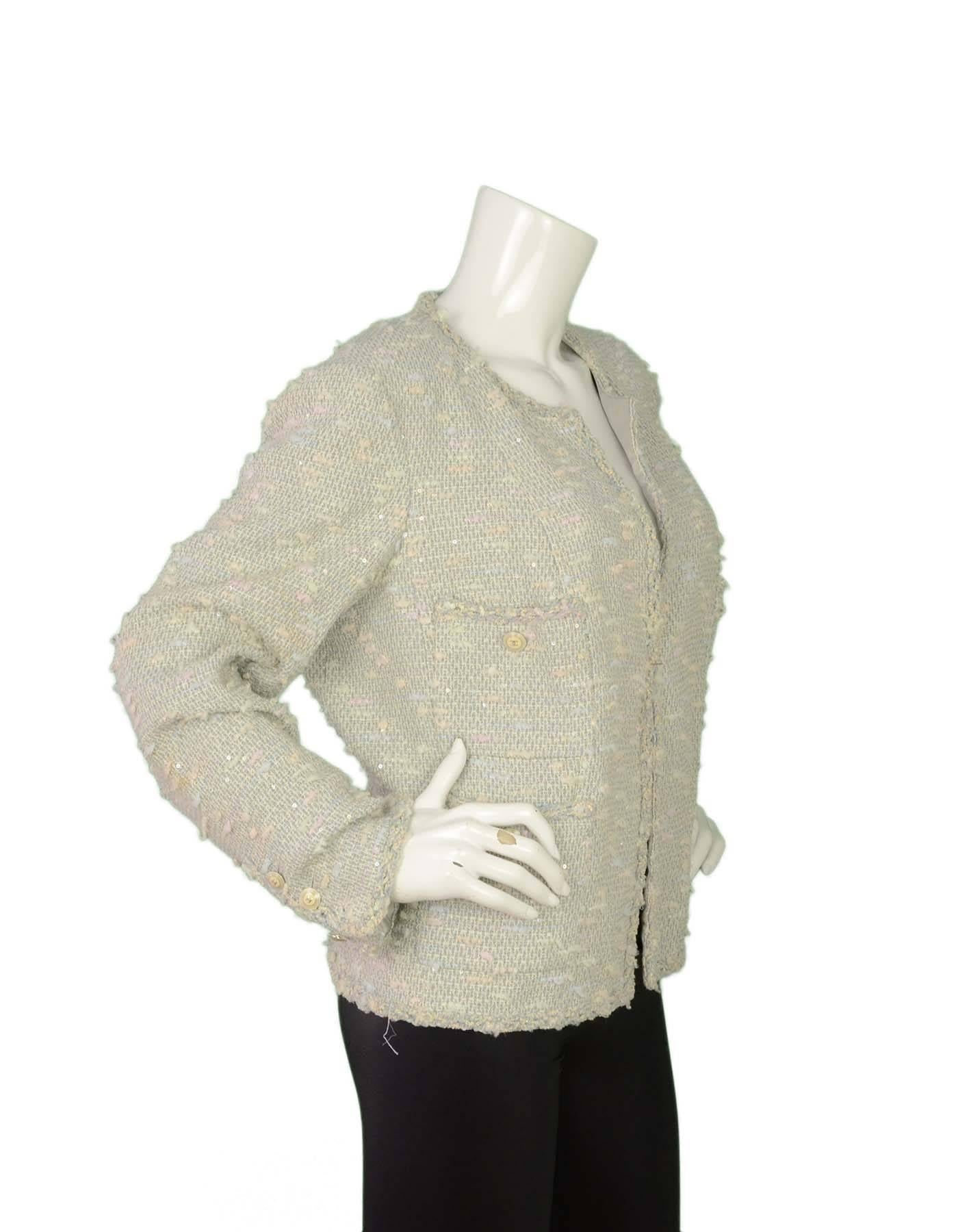 Chanel Pastel Blue Tweed Open Front Jacket 
Features pastel sequins throughout
Made In: France
Year of Production: 2007
Color: Blue and white
Composition: 38% nylon, 25% cotton, 25% wool, 12% polyester
Lining: Pale blue, 100% silk
Closure/Opening: